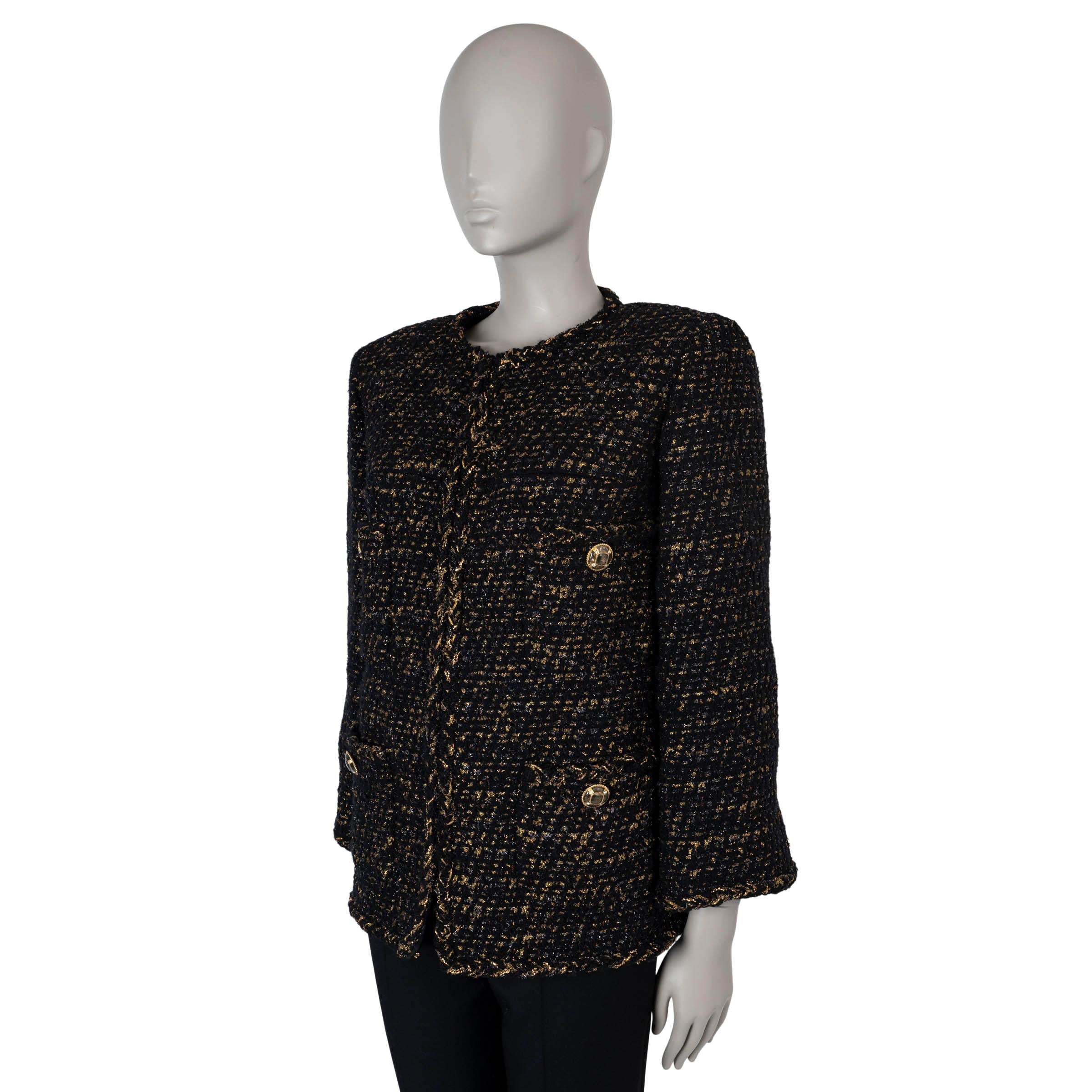 This 100% authentic Chanel collarless tweed jacket is crafted from a luxurious blend of black and gold wool (57%), polyamide (32%), polyester (7%), and silk (4%). It features a round neck, oversized silhouette with thick shoulder pads, elegant braid