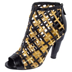 Used Chanel Black/Gold Woven Caged Leather Open Toe Swirl Heel Booties Size 37.5