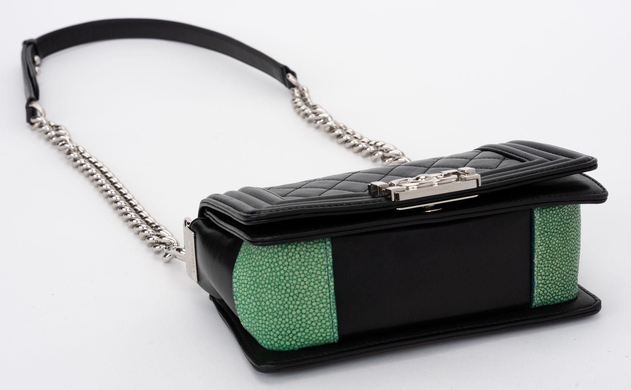 Chanel authentic boy bag small in black quilted lambskin leather , green stingray accents and silver tone hardware. Shoulder drop 23