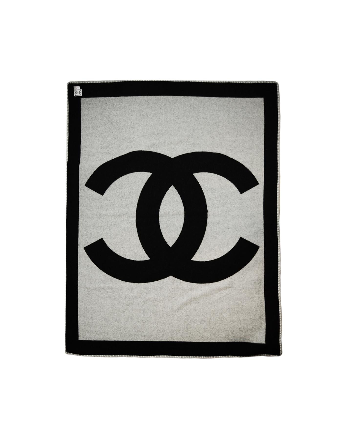 Chanel Black Grey Merino Wool & Cashmere CC Throw Blanket

Made In: Scotland 
Color: Black, Grey
Materials: 90% Wool, 10% Cashmere
Overall Condition: Excellent pre-owned condition
Includes: Dustbag

Measurements:  
72