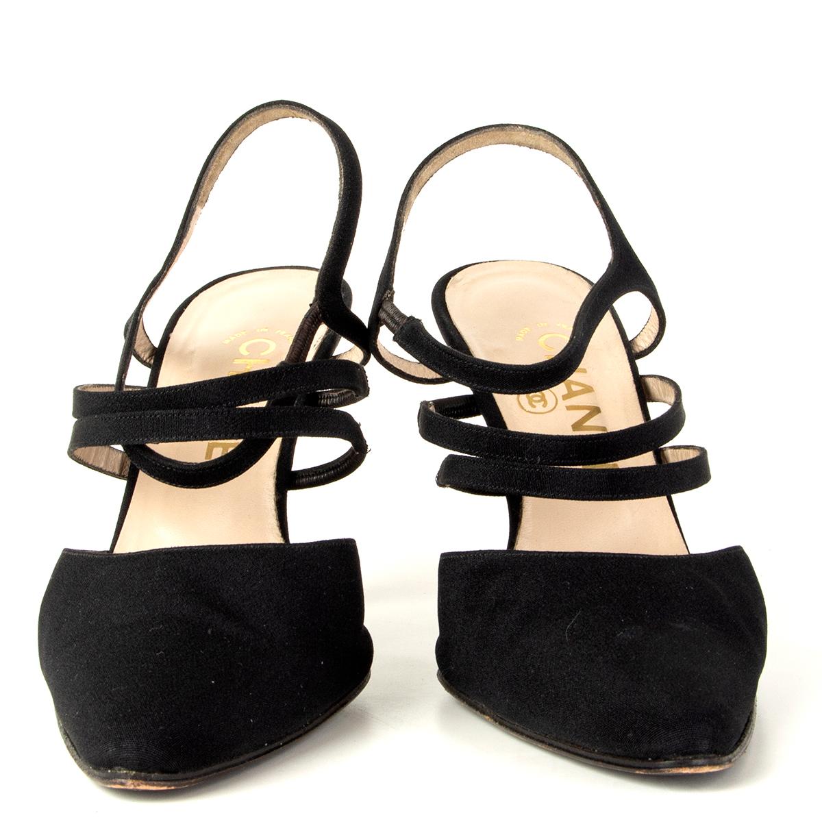 100% authentic Chanel Vintage strappy mules in black grosgrain fabric. Have been worn and are in excellent condition.

Measurements
Imprinted Size	38
Shoe Size	38
Inside Sole	25cm (9.8in)
Width	7cm (2.7in)
Heel	9cm (3.5in)

All our listings include