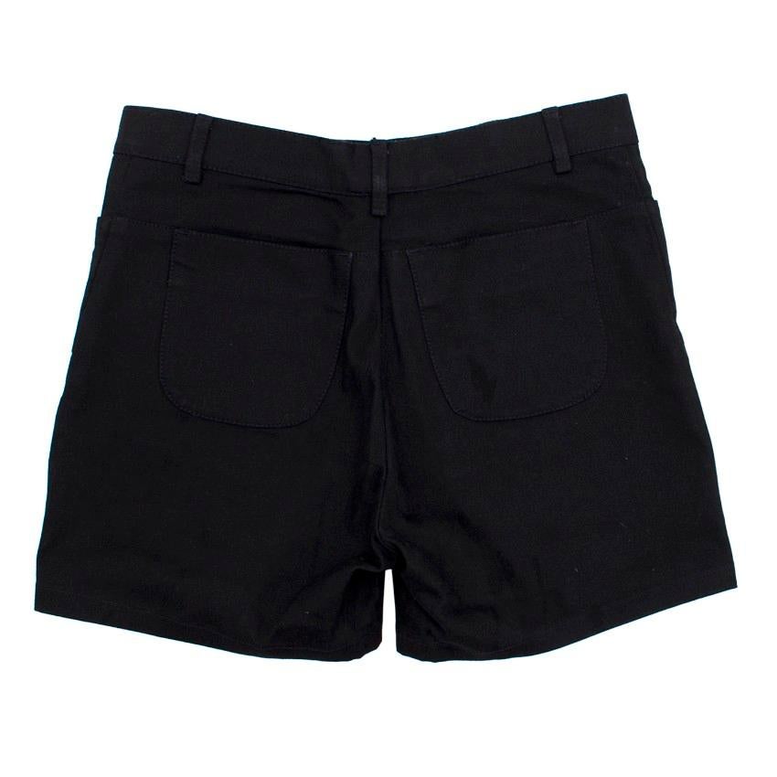 Chanel black high- waisted shorts. 
Made in Italy. 

High- waisted shorts. 
Features three front pockets and two back pockets. 

Fabric: 98% Cotton, 2% Elastane/Spandex.   

Please note, these items are pre-owned and may show signs of being stored