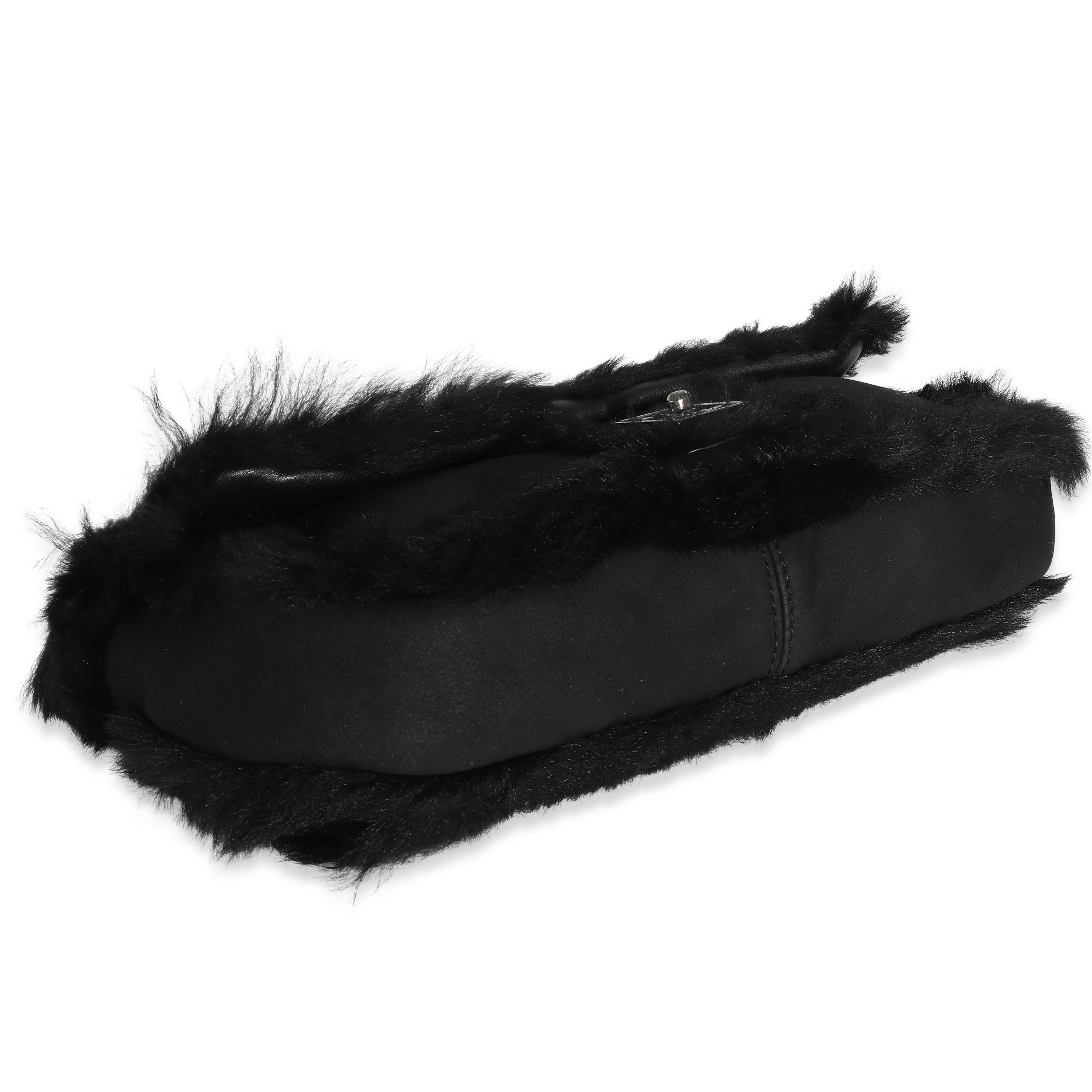 Listing Title: Chanel Black Horizontal Stitch Shearling CC Flap Bag
SKU: 137252
Condition: Pre-owned 
Condition Description: A timeless classic that never goes out of style, the flap bag from Chanel dates back to 1955 and has seen a number of