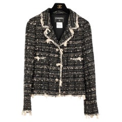 Chanel Schwarze & elfenbeinfarbene Tweed-Jacke 38 FR