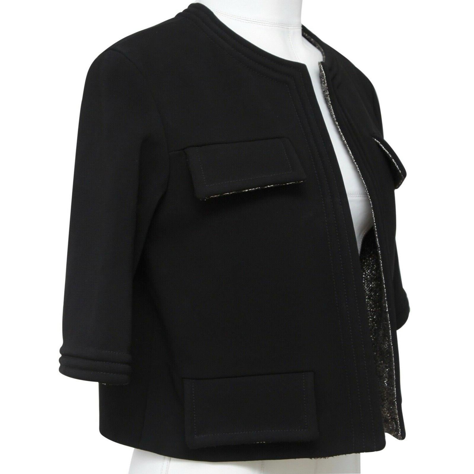 GUARANTEED AUTHENTIC RUNWAY FALL 2012 CHANEL BLACK CROPPED JACKET


Design:
- Chanel black cropped jacket.
- Open front.
- Crew neckline.
- Four faux pockets at front.
- Short sleeve.
- Metallic lining.
- Signature chain at hem.

Fabric: 96%
