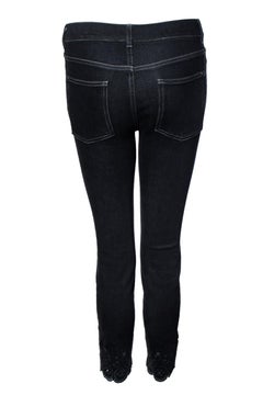 Chanel, black jeans with floral lasercut print