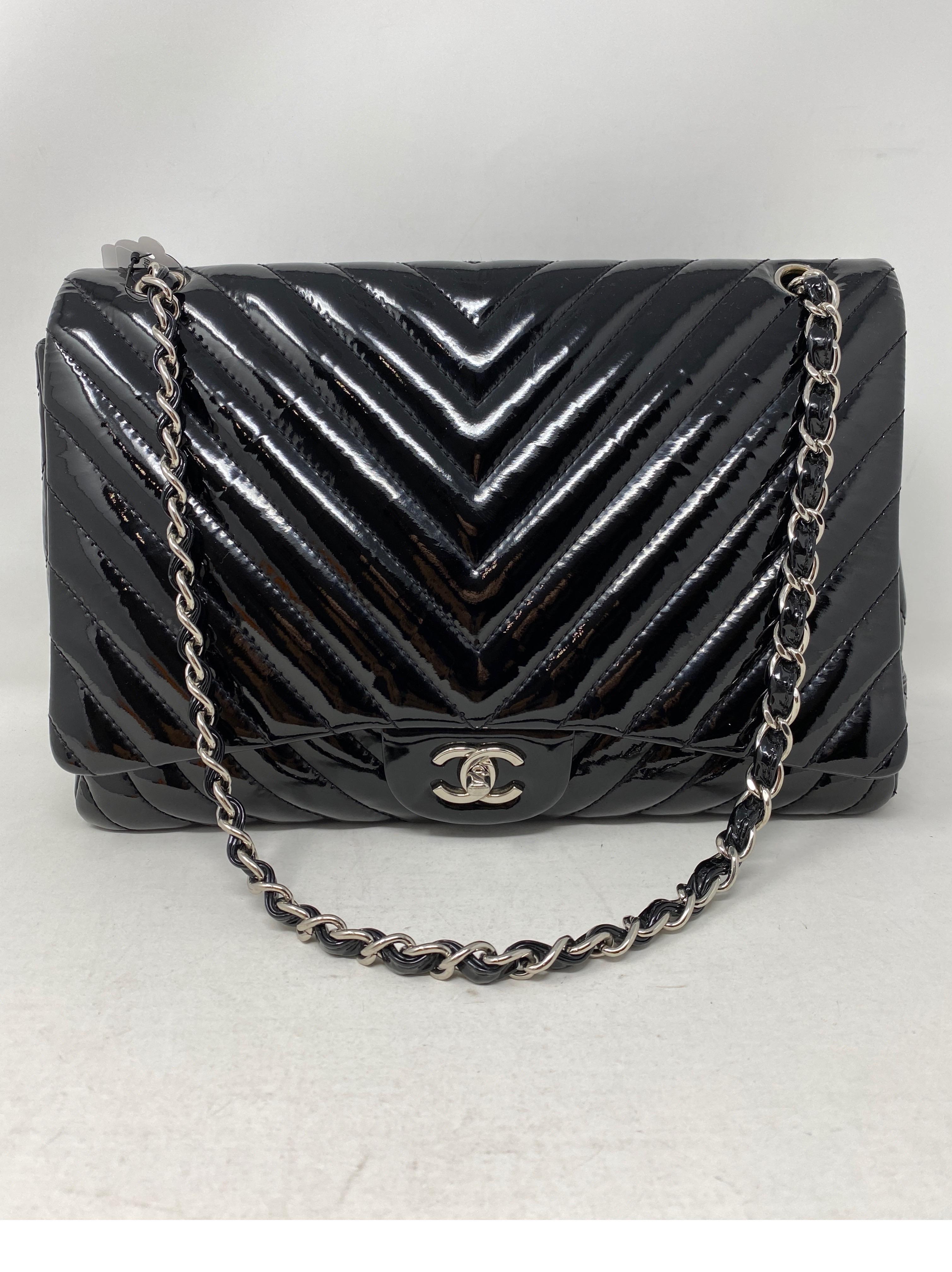 Chanel Black Jumbo Patent Leather Bag. Silver hardware. Good condition. Can be worn doubled or as a crossbody. Single flap. Good condition. Serial number inside the bag. Guaranteed authentic. 
