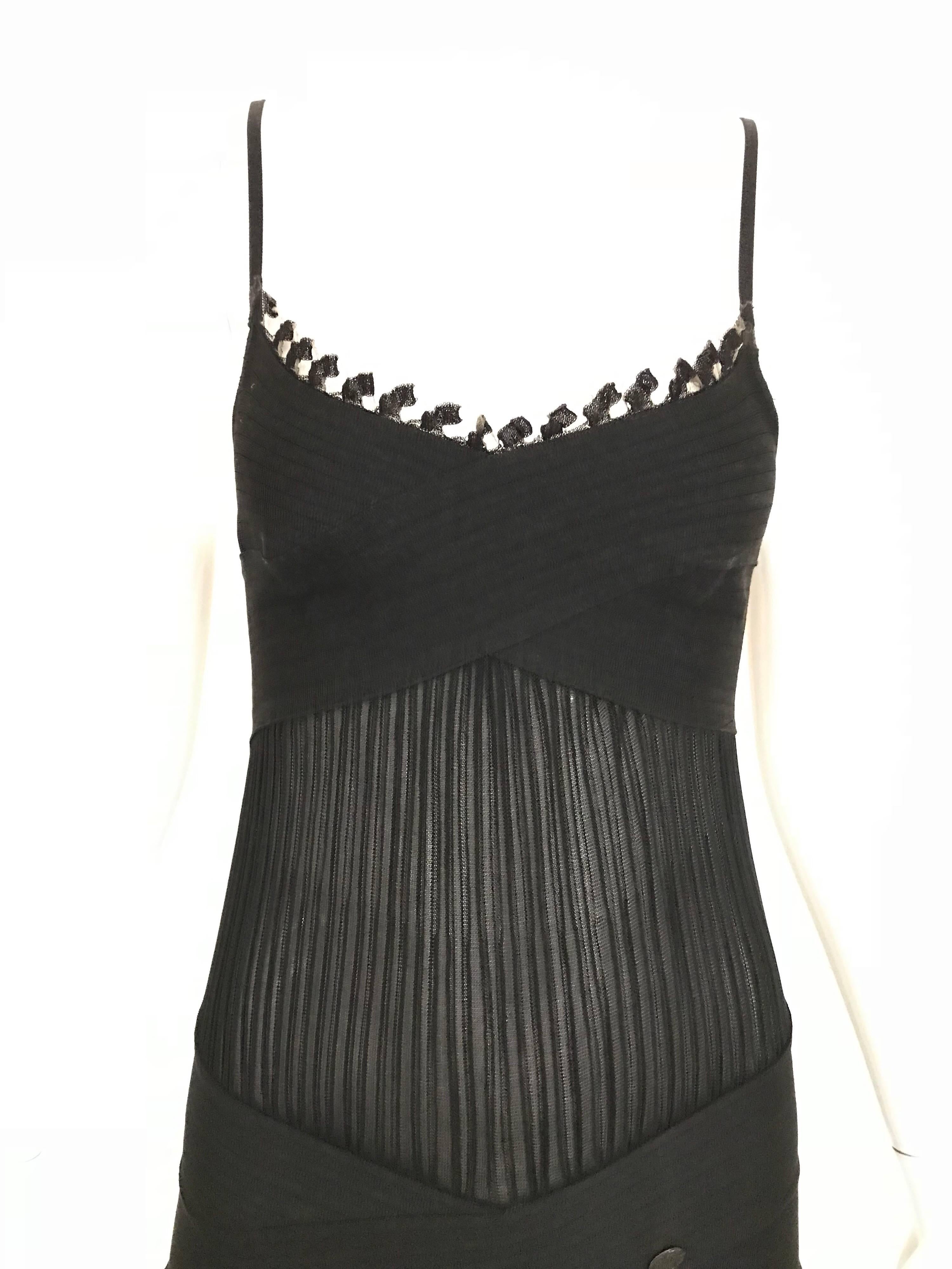 Sexy CHANEL spaghetti strap knit cocktail dress.  
Excellent condition.  Fit size Small / 2 or 4 ( dress is stretchy)
Measurement:
Bust: 28' stretch up to 32