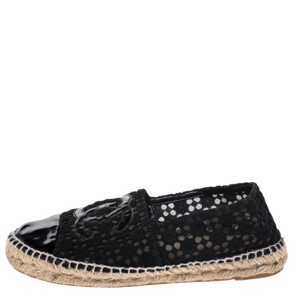 Step out in style every day with these gorgeous espadrilles from Chanel. Featuring a leather, lace and mesh exterior, this round-toe pair is completed with braided jute details on the midsoles and the CC logo on the uppers.

Includes:
Original