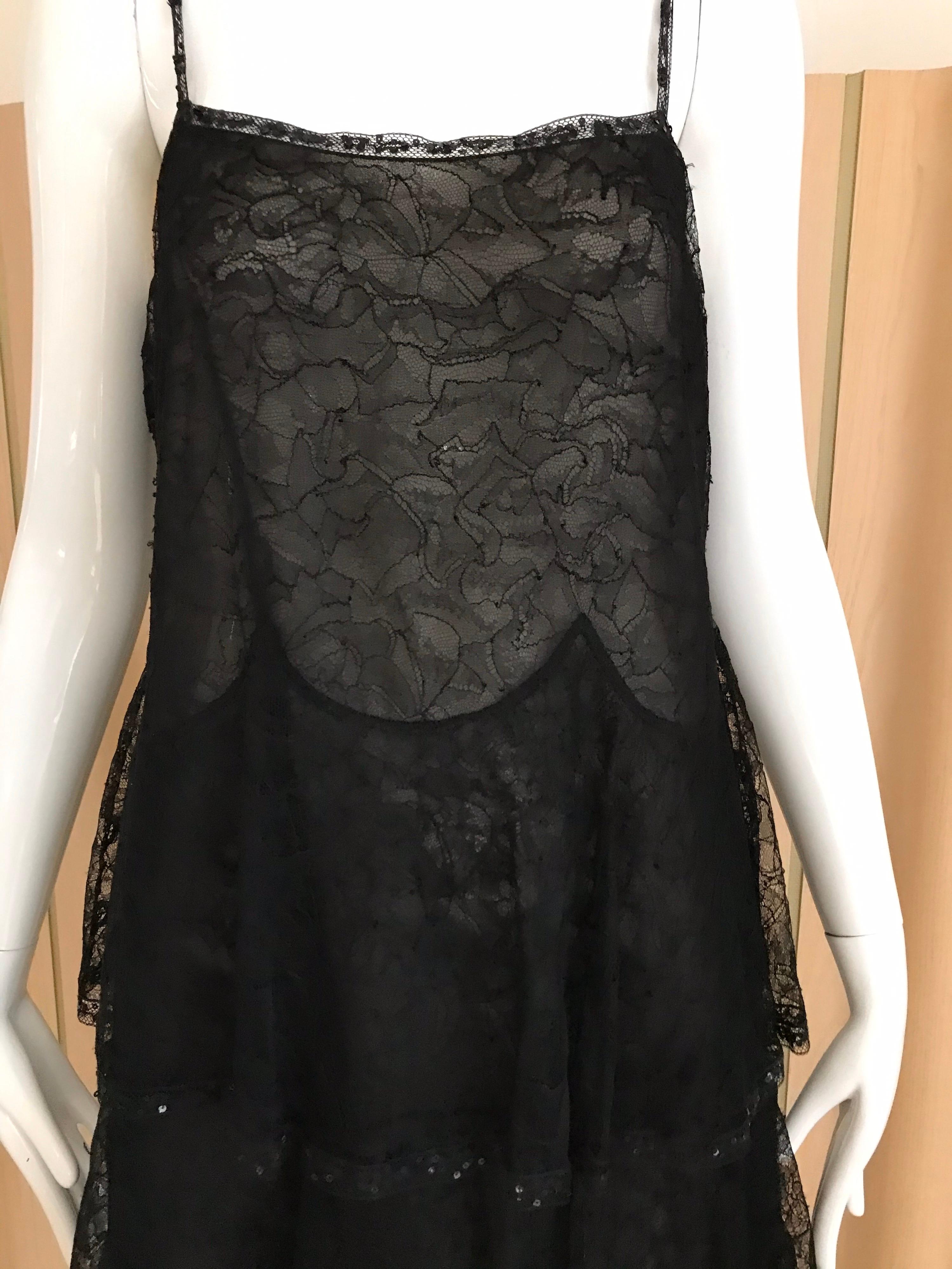 2000s CHANEL black lace silk spaghetti dress.
Marked size: 40. Fit US size 6