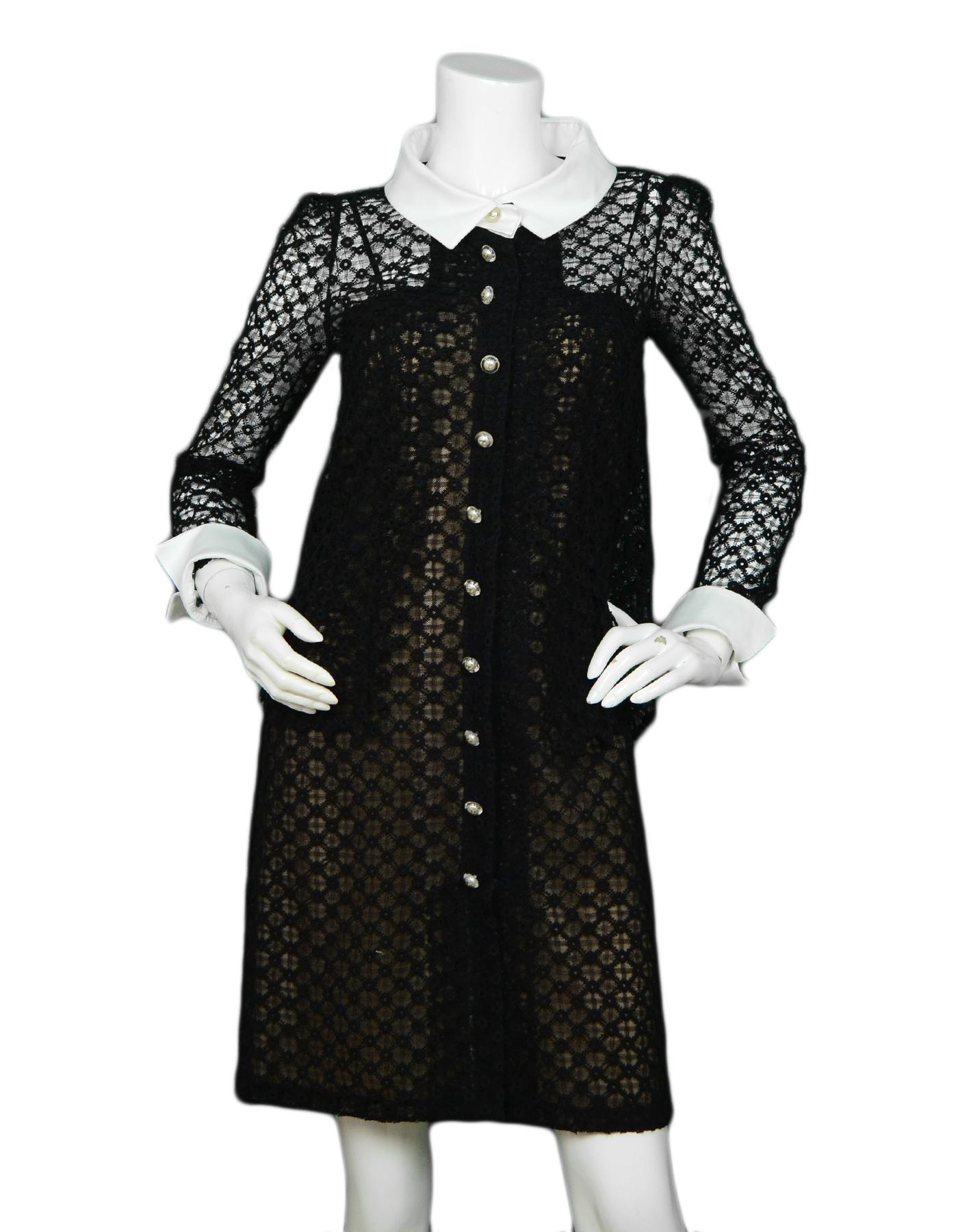 Chanel Black Lace Dress w/ White Cuffs & Embedded Pearl Buttons sz 38

Made In: France
Year of Production: 2016
Color: Black, white
Materials: 100% cotton. Combo 98% cotton, 2% spandex
Lining: 100% silk
Opening/Closure: Front zipper closure with