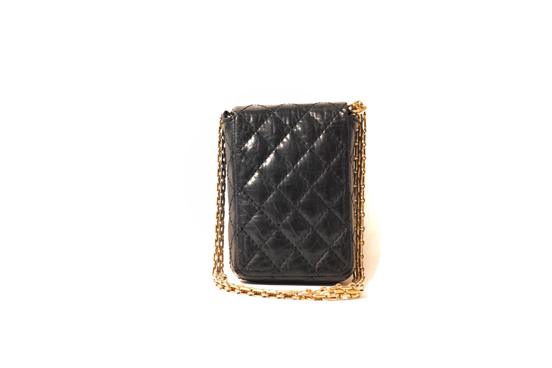 This authentic Chanel Black Lambskin 2.55 Phone Case is in very good condition.  Perfect for when only the essentials are necessary, this piece looks great with everything. 
Black lambskin small bag is quilted in signature Chanel diamond pattern. 
