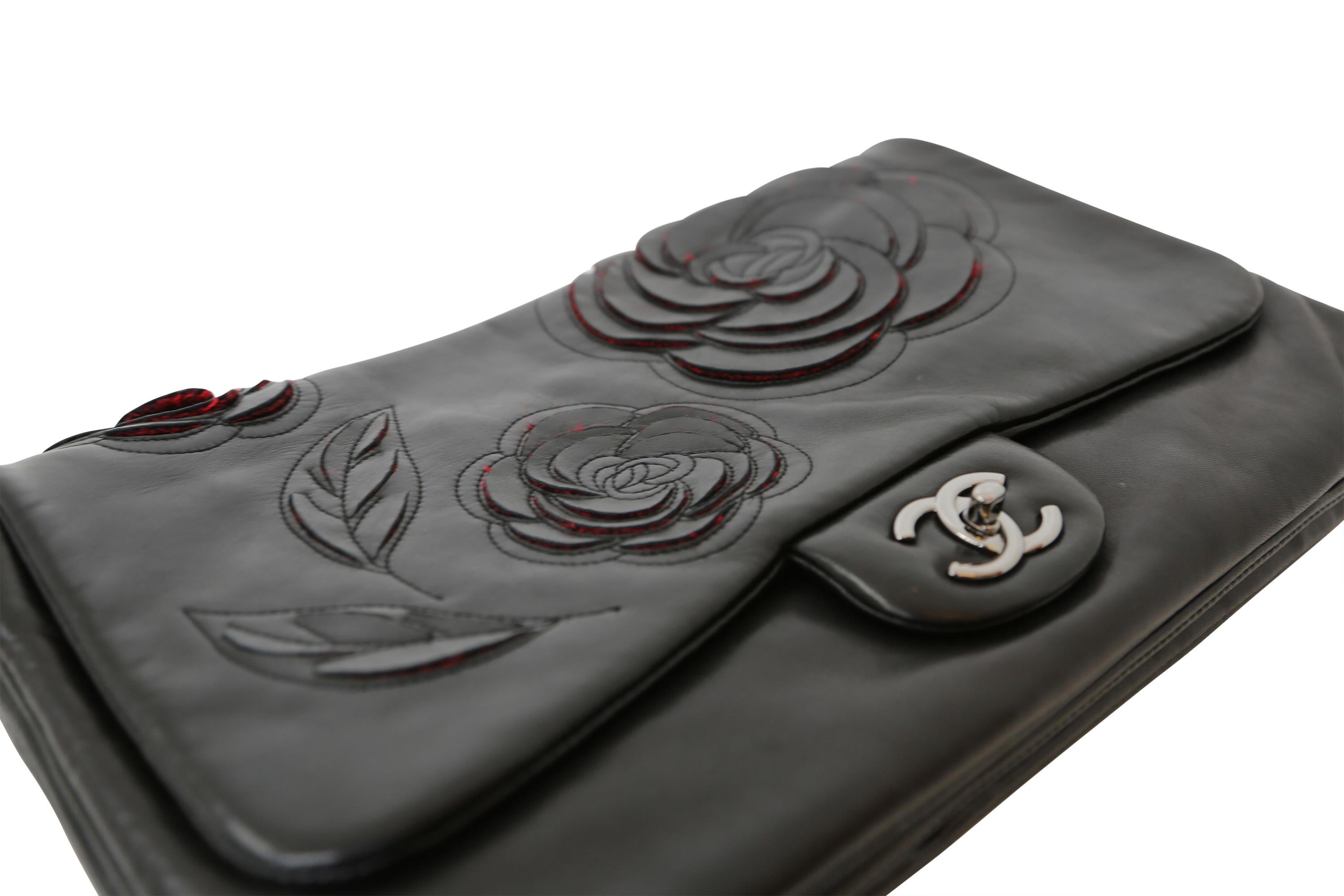 Women's or Men's Chanel Black Lambskin Camellia Runway Flap Bag For Sale