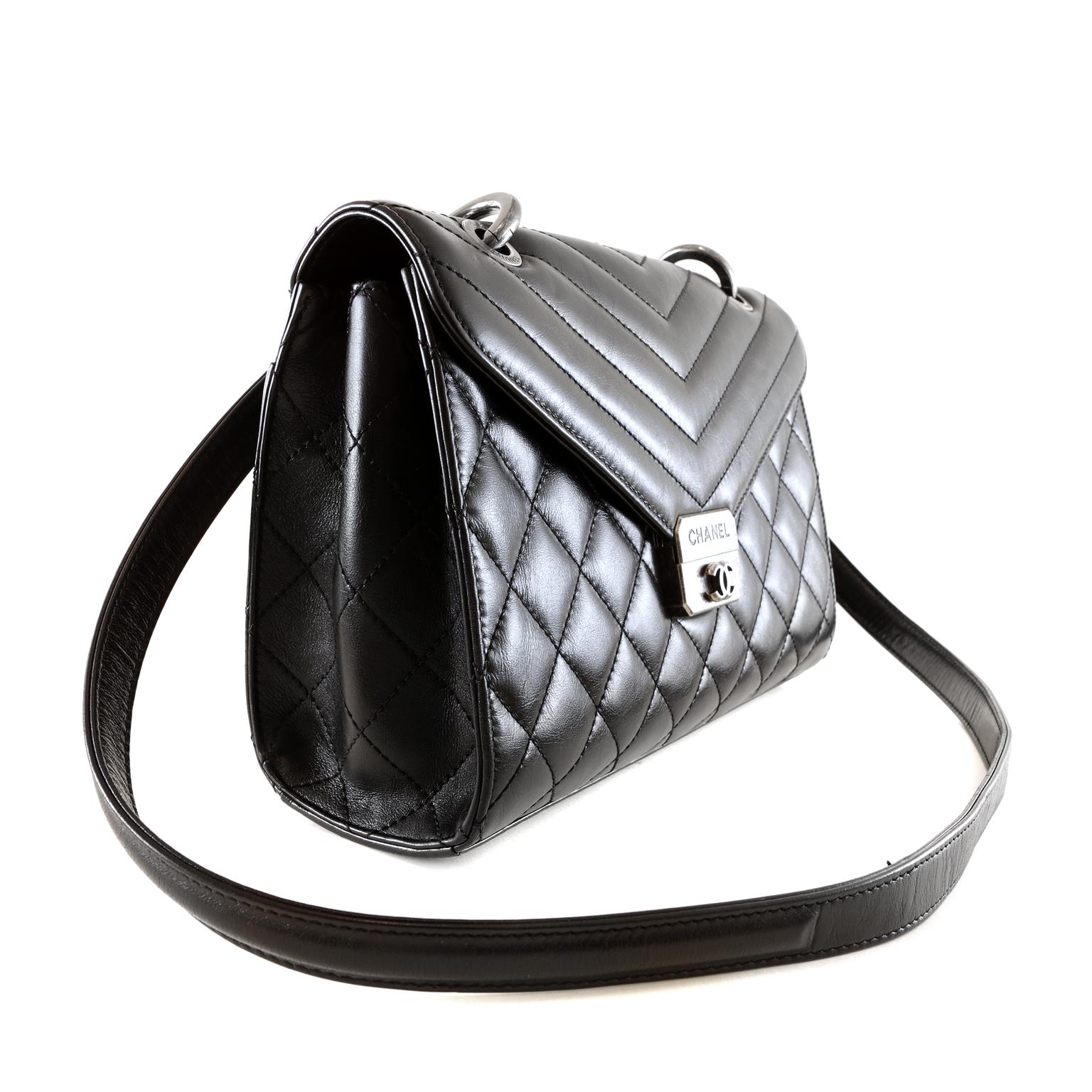 Chanel Black Lambskin Chevron Crossbody - PRISTINE UNWORN CONDITION
  Uniquely styled with a leather crossbody strap and a shorter edgy chain strap, this piece is versatile and sporty.
Black lambskin is quilted in signature Chanel diamond pattern