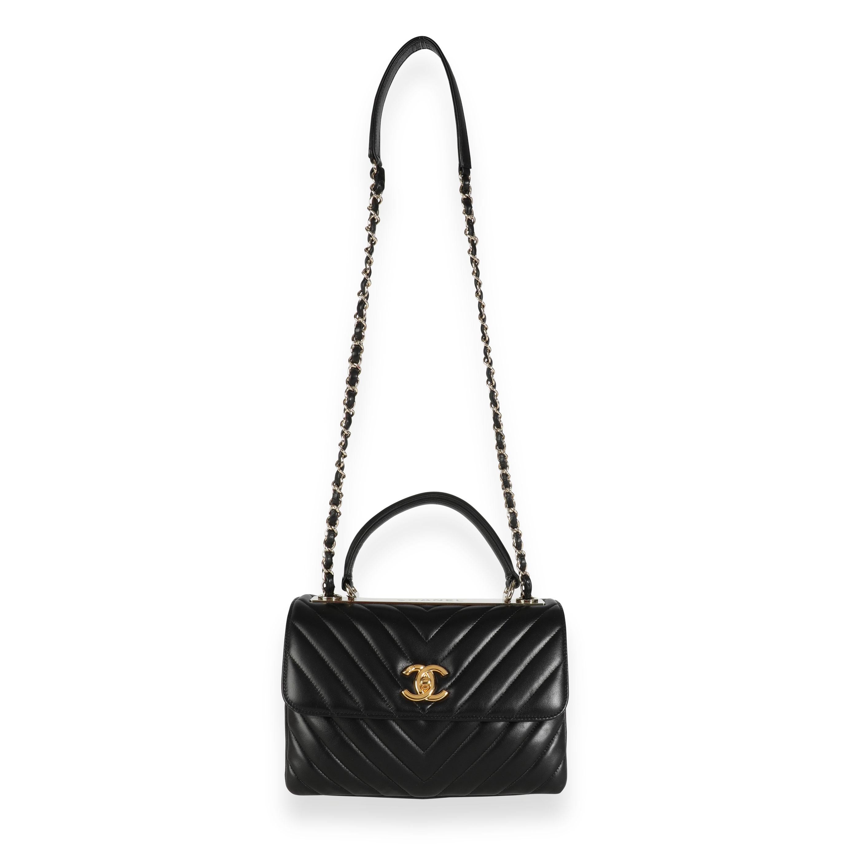 Listing Title: Chanel Black Lambskin Chevron Quilted Trendy CC Top Handle Flap Bag
SKU: 111176
Condition: Pre-owned (3000)
Handbag Condition: Very Good
Condition Comments: Very Good Condition. Dents to leather. Scratching to inside flap. Slight