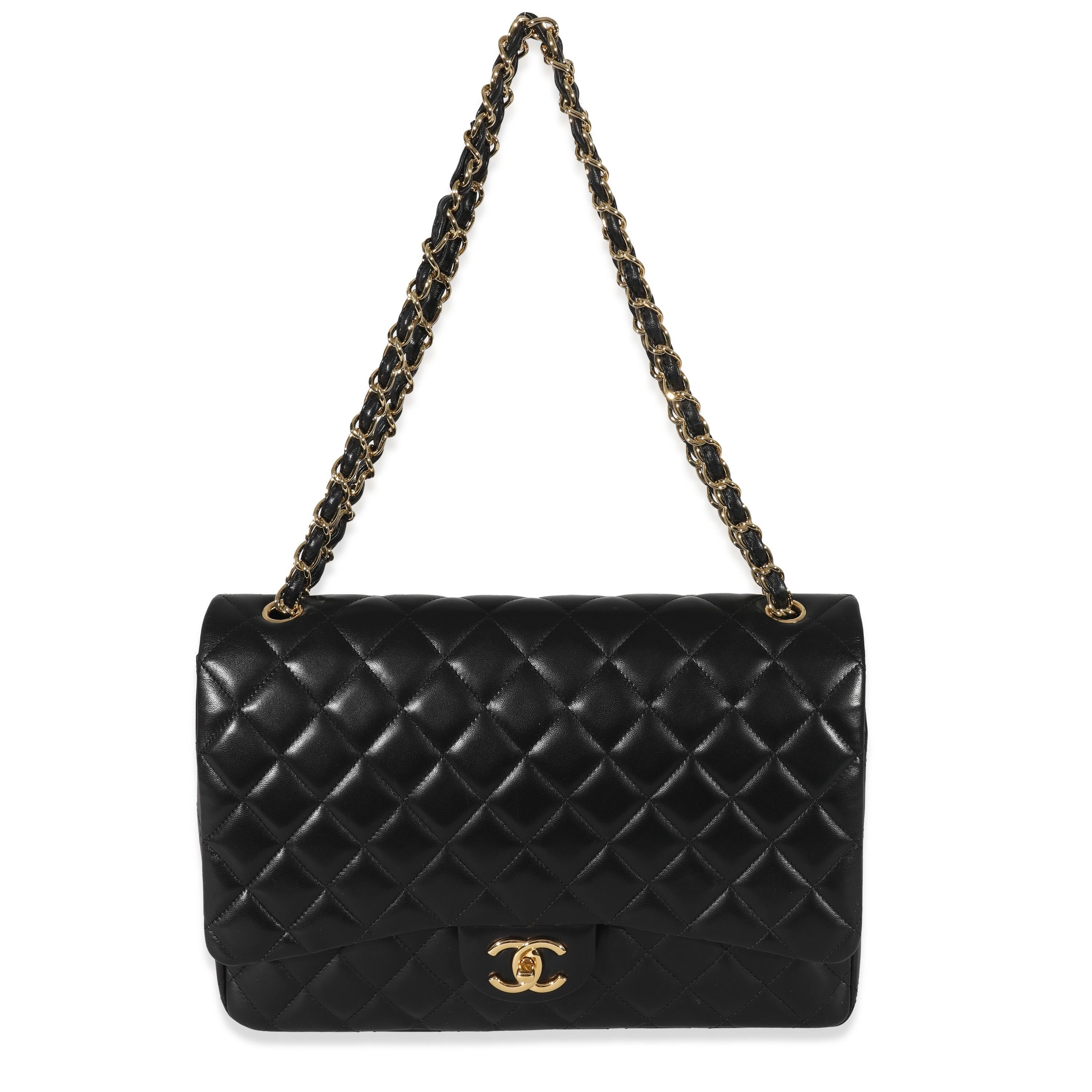 Listing Title: Chanel Black Lambskin Classic Maxi Double Flap Bag
SKU: 130512
Condition: Pre-owned 
Handbag Condition: Very Good
Condition Comments: Item is in very good condition with minor signs of wear. Exterior heavy scuffing and indentation