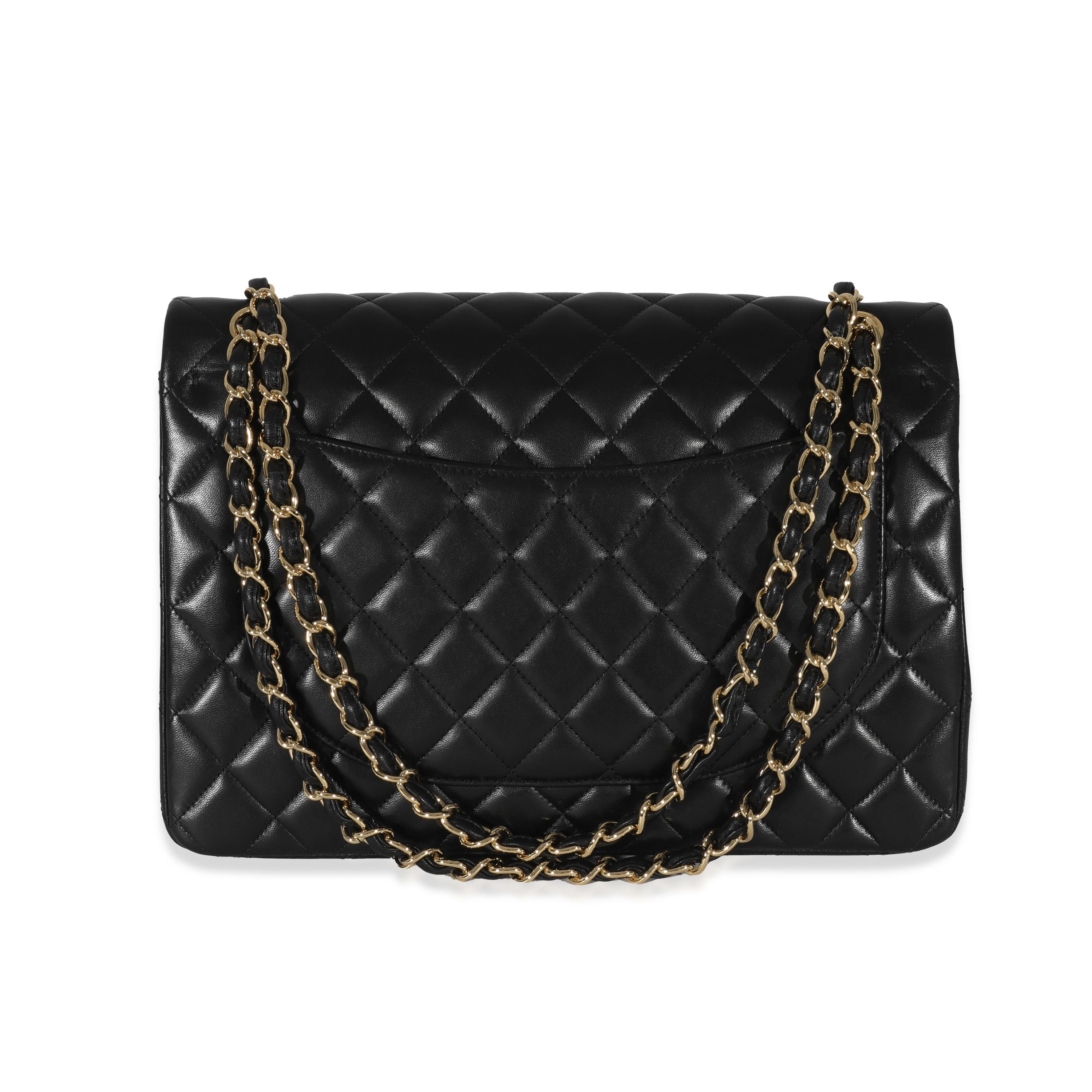 Chanel Black Lambskin Classic Maxi Double Flap Bag In Excellent Condition For Sale In New York, NY
