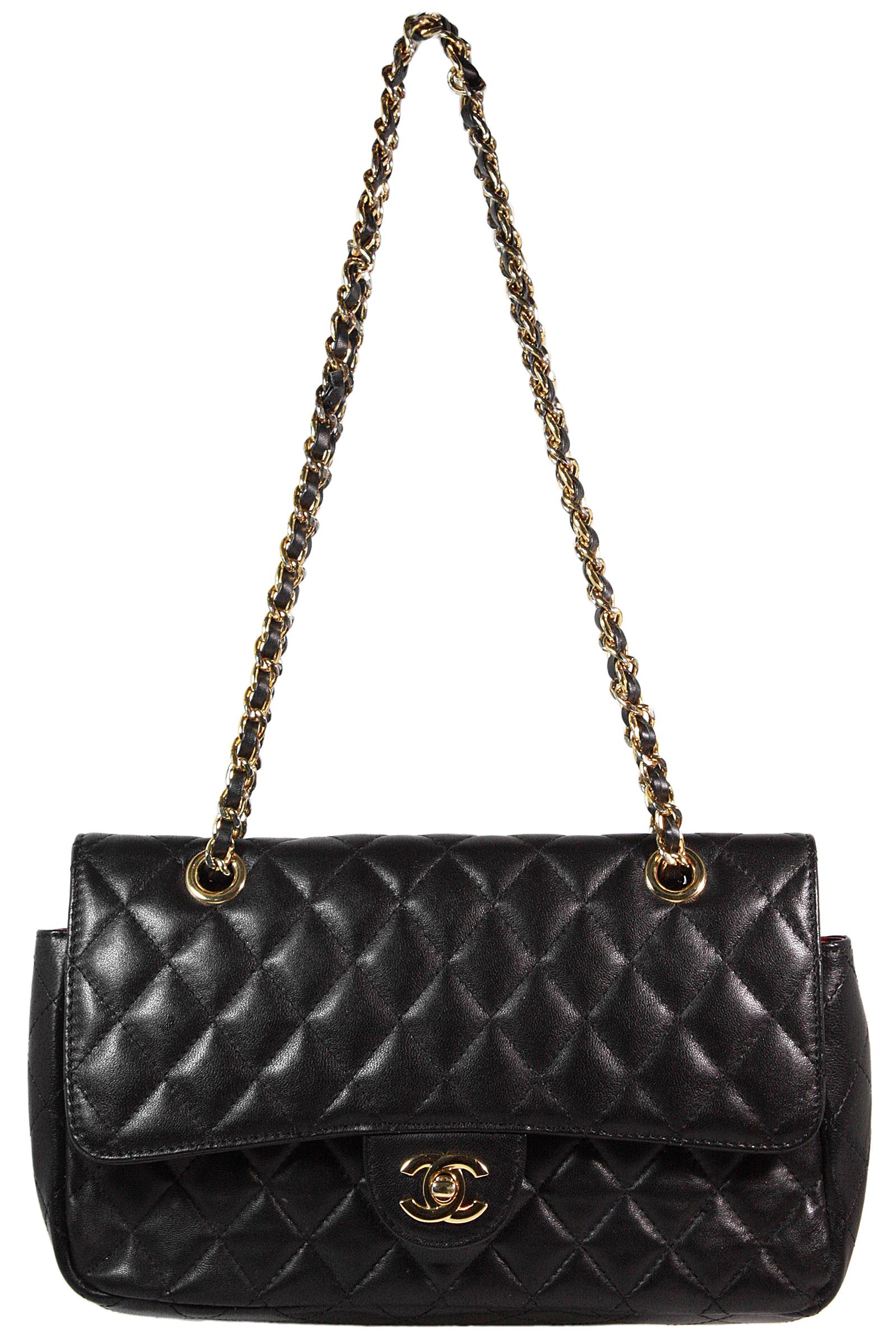 Chanel double strap bag
Made in France
Soft black quilted Lambskin leather 
Gold metal classic CC logo clasp
Inner snap pouch
Gold metal and threaded leather chain strap
Strap length as one chain: 40 inches
Double strap length: 24 inches
Red leather