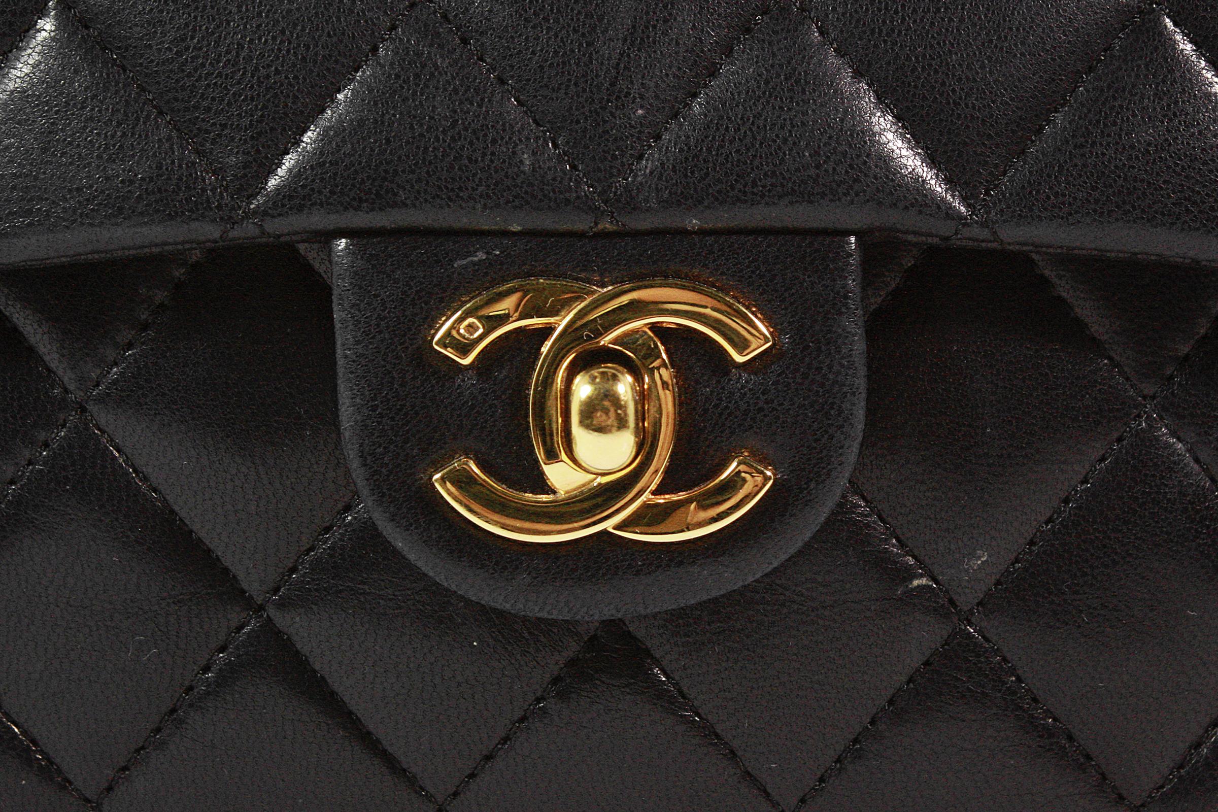 Chanel Black Lambskin Classic Quilted Mini Crossbody Bag In Good Condition In Los Angeles, CA