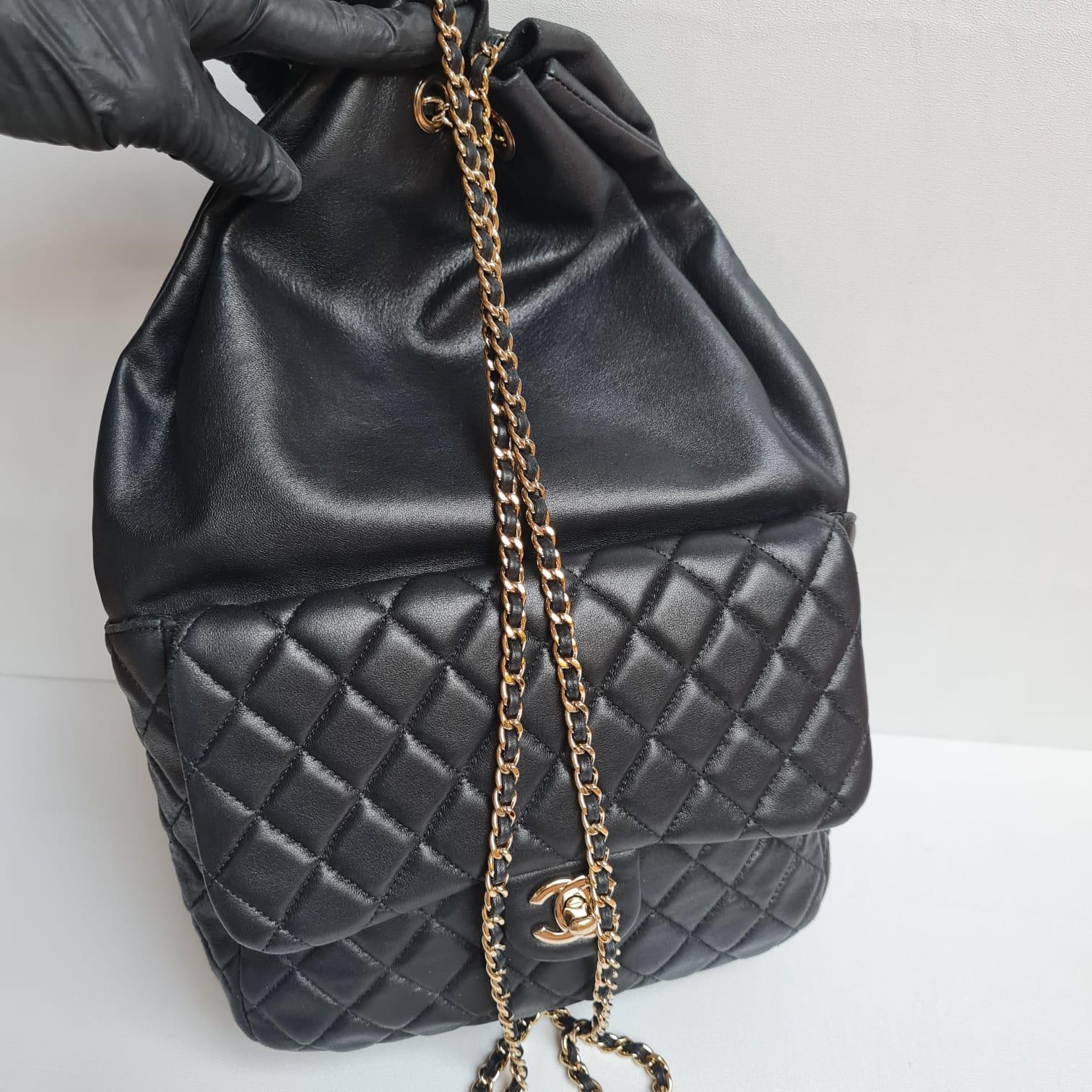 Beautiful supple drawstring Chanel bag, with classic quilted front pocket area. Light scratches on exterior surface. Minor scratches on hardware details. Marks and scratches on inner flap. Minor rubbing on trims and corners. Comes with dust bag