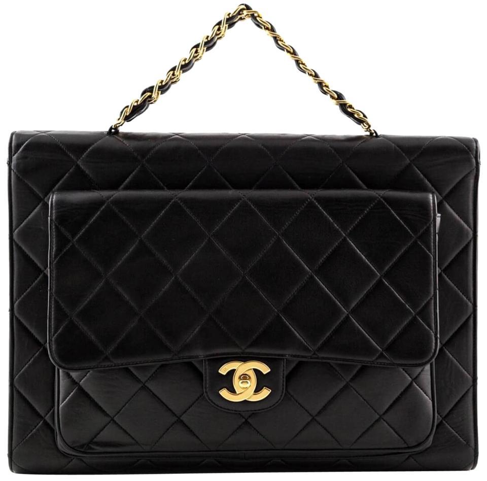 Chanel Rare Vintage Gold Top Handle Business Portfolio Briefcase

Year: 1994 {VINTAGE 30 Years}
Gold hardware
Quilted lambskin leather
Two Sided CC Turnlock
Classic interwoven chain top handle
Main compartment has burgundy leather lined