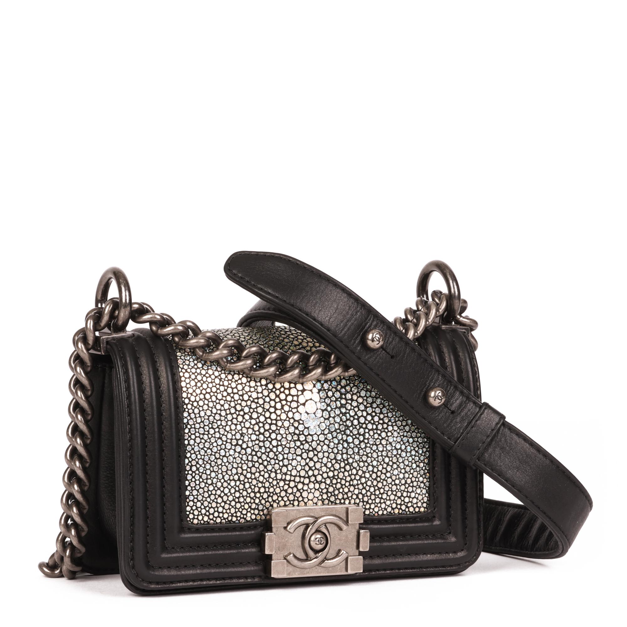 CHANEL
Black Lambskin & Hologram Galuchat Micro Le Boy

Serial Number: 19736185
Age (Circa): 2014
Accompanied By: Chanel Dust Bag
Authenticity Details: Serial Sticker (Made in Italy)
Gender: Ladies
Type: Shoulder, Crossbody

Colour: Black
Hardware: