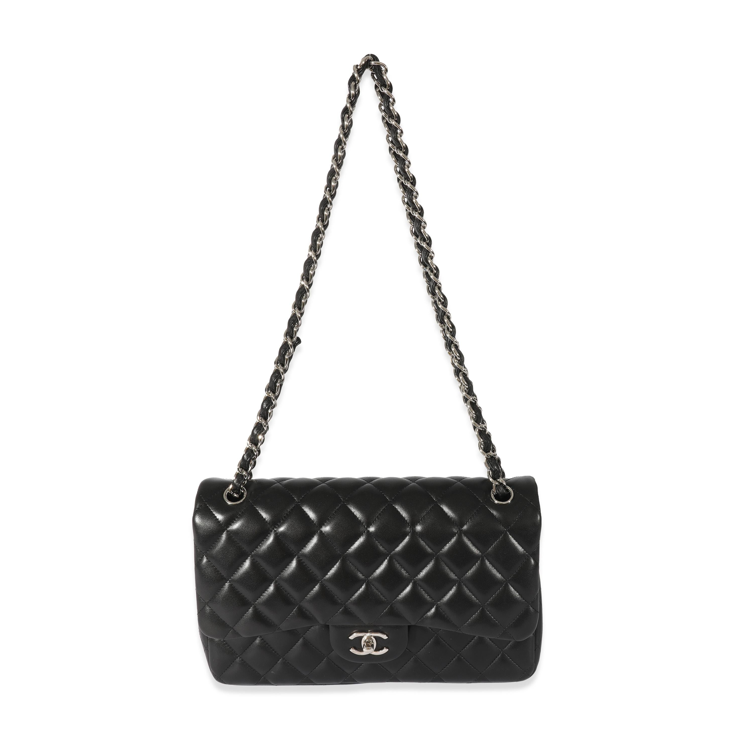 Listing Title: Chanel Black Lambskin Jumbo Classic Double Flap
 SKU: 128668
 MSRP: 9500.00
 Condition: Pre-owned 
 Condition Description: A timeless classic that never goes out of style, the flap bag from Chanel dates back to 1955 and has seen a