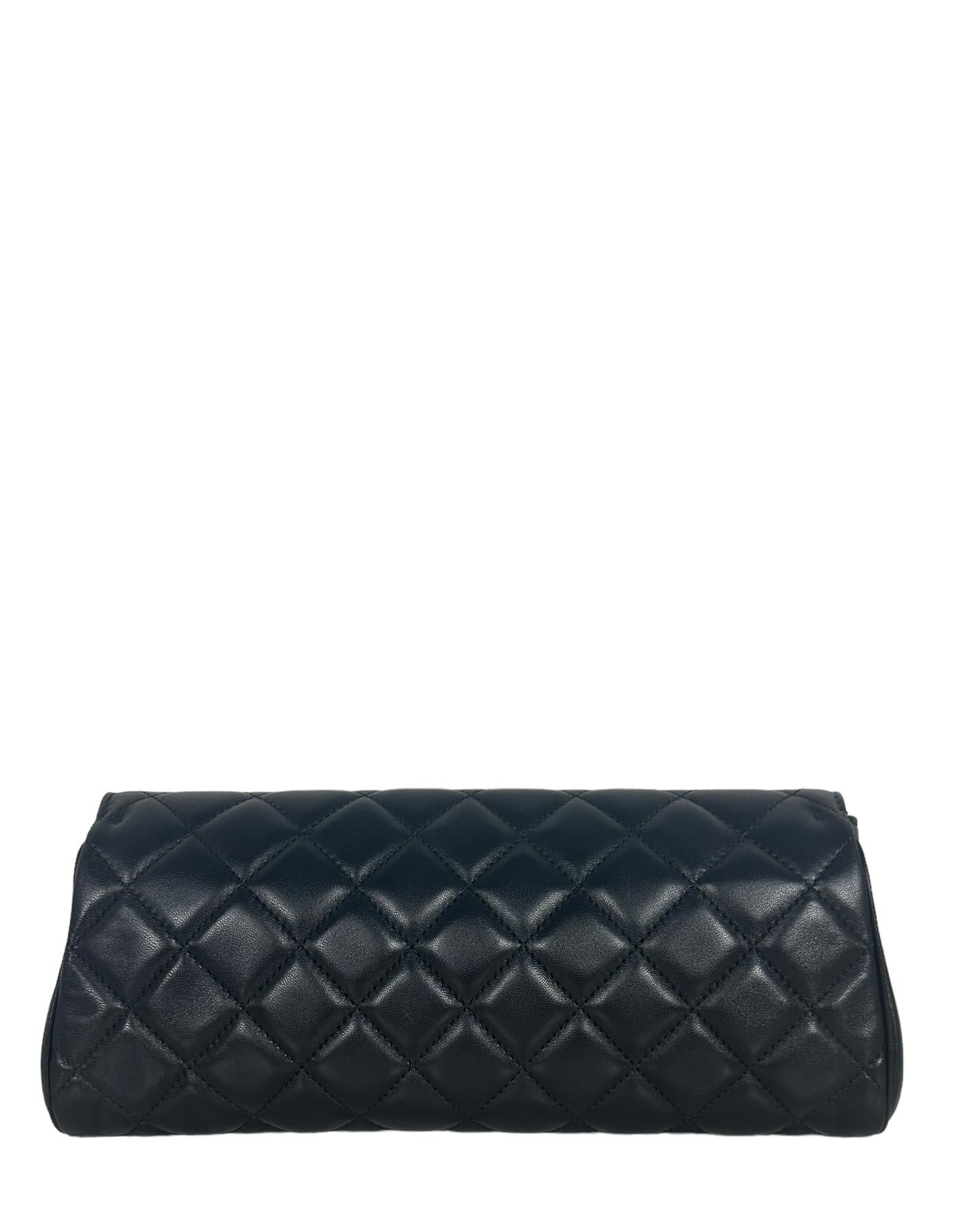 Chanel Black Lambskin CC Twistlock Clutch Bag

Made In: Italy
Year of Production: 2014
Color: Black
Hardware: Darkened silvertone
Materials: Lambskin leather
Lining: Black silk
Closure/Opening: Flap top with cc twistlock closure
Exterior Pockets: