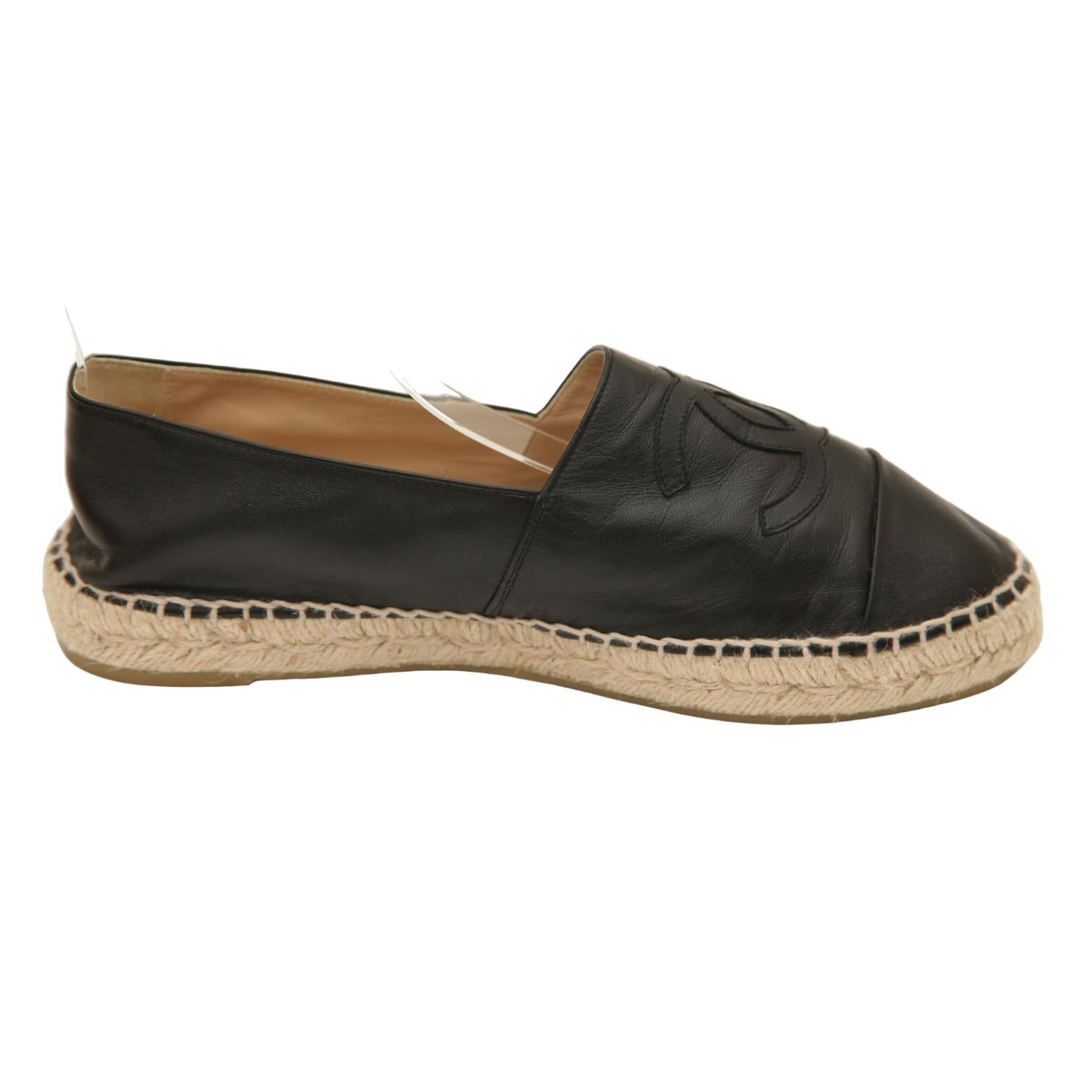 GUARANTEED AUTHENTIC CHANEL BLACK LAMBSKIN LEATHER ESPADRILLES

Details:
- Black lambskin leather uppers.
- CC logo stitched cap toe.
- Slip on.
- Leather insole and rubber sole.
- Comes with dust bag.

Size: 40

Measurements (Approximate):
-