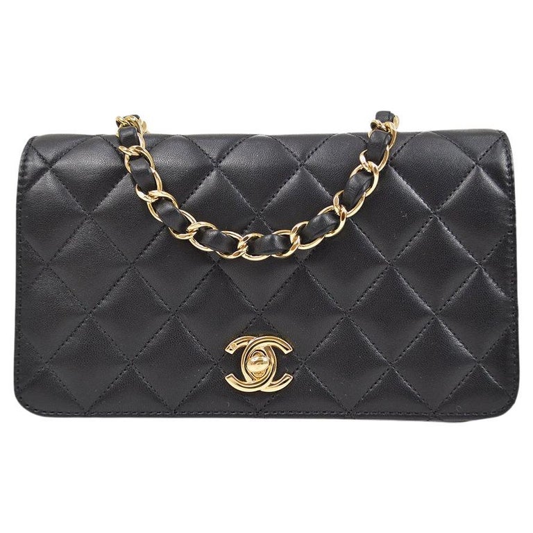 Chanel Small Classic Flap Bag in White Lambskin with golden hardware