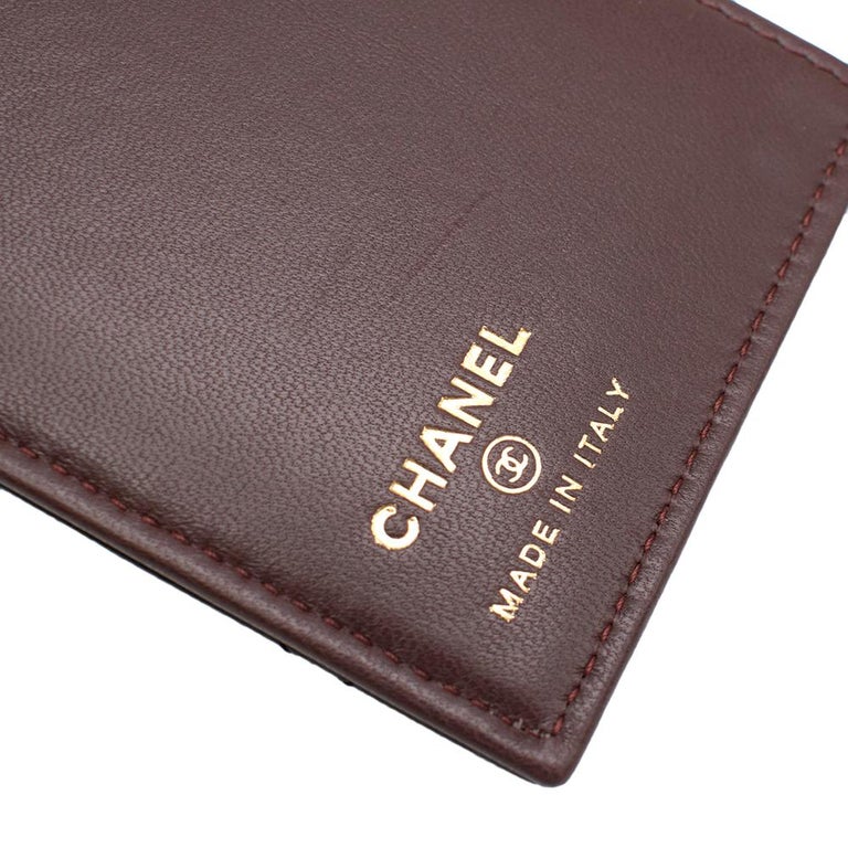 Chanel Black Lambskin Leather and Gold-tone CC Passport Case at