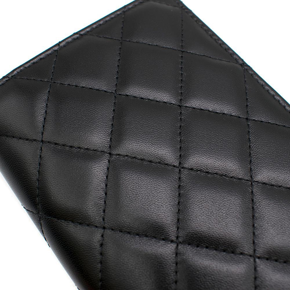 Chanel Black Lambskin Leather & Gold-tone CC Passport Case In Excellent Condition In London, GB