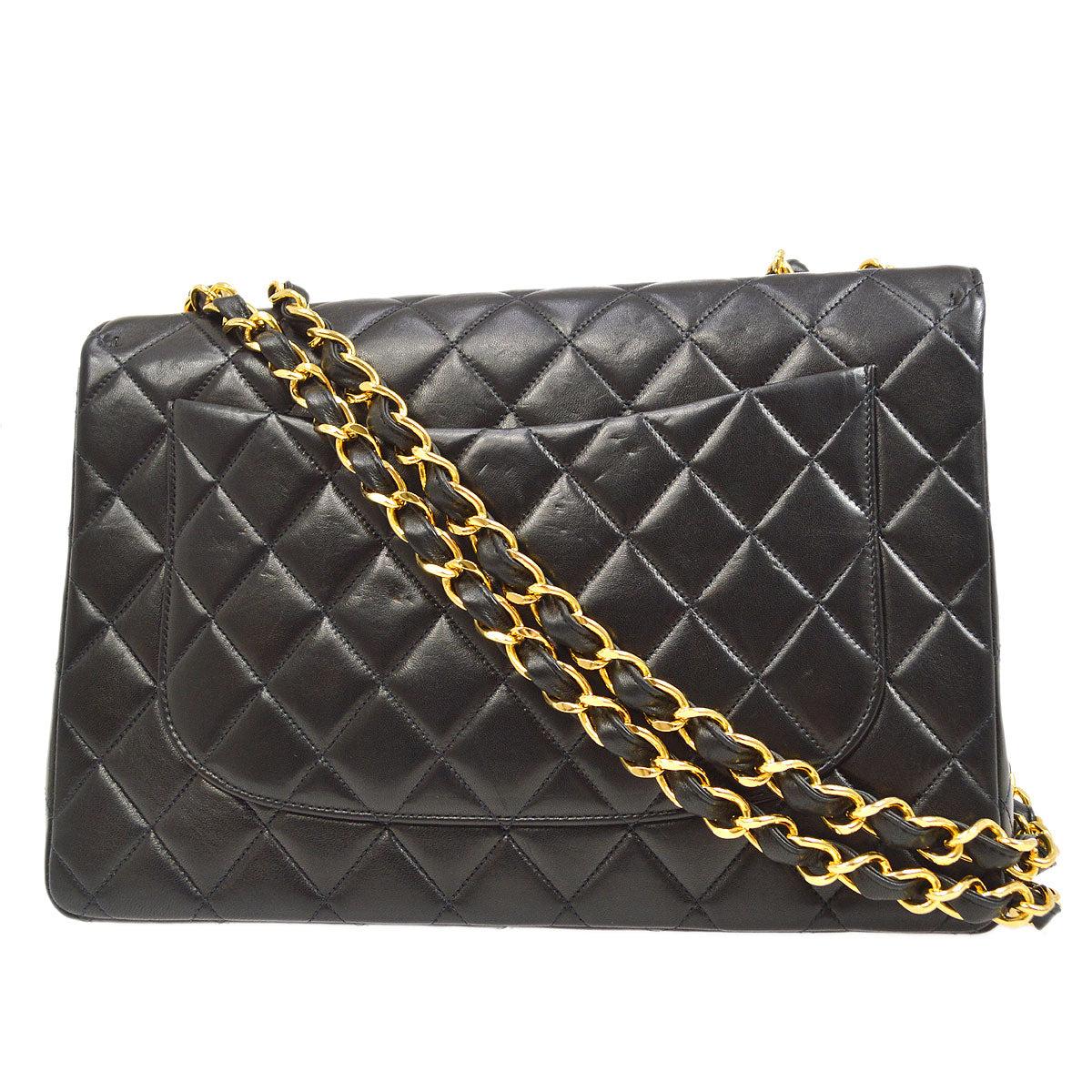 CHANEL Black Lambskin Leather Large Gold CC Jumbo Shoulder Flap Bag In Good Condition For Sale In Chicago, IL