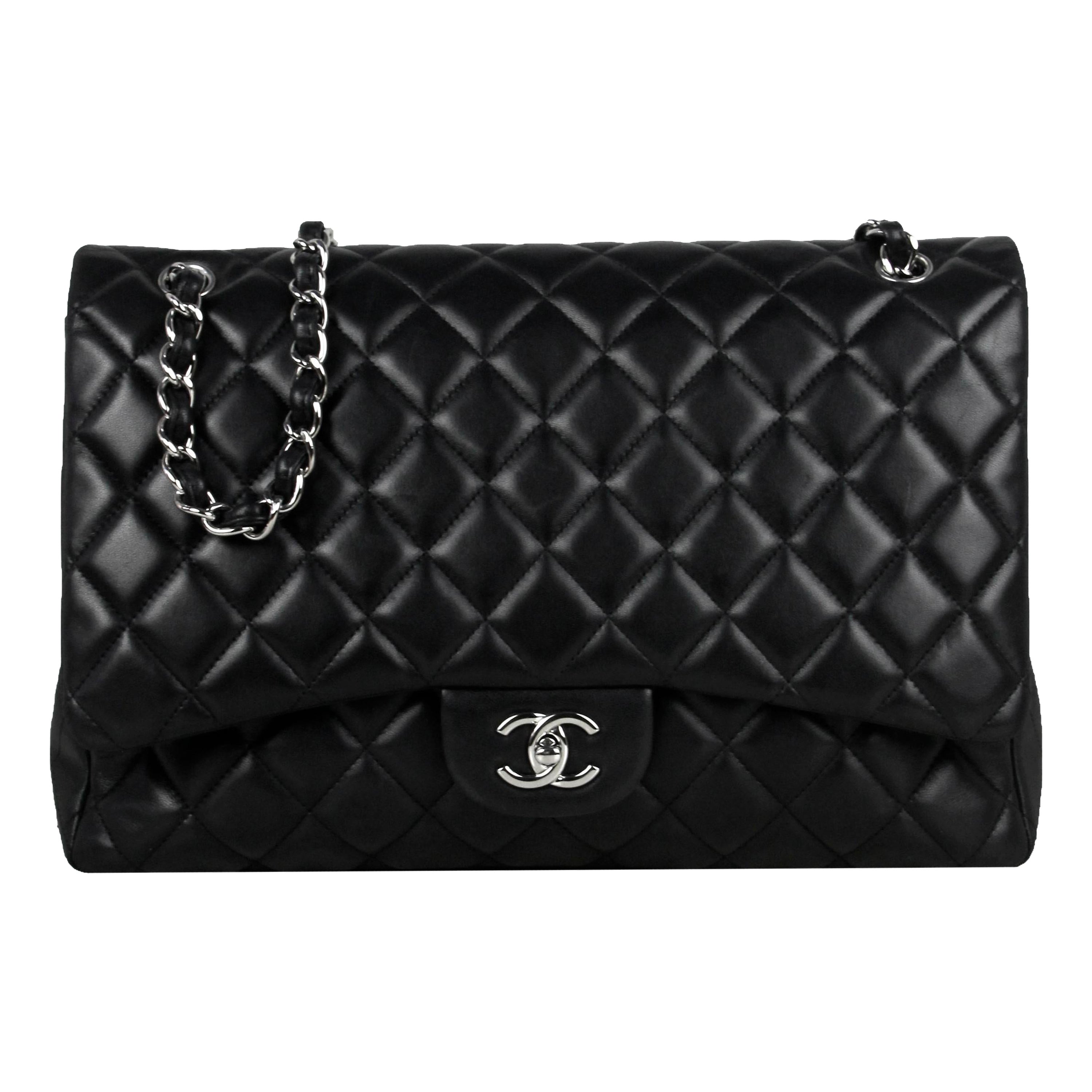 Chanel - Sac Maxi à rabat unique en cuir d'agneau noir matelassé