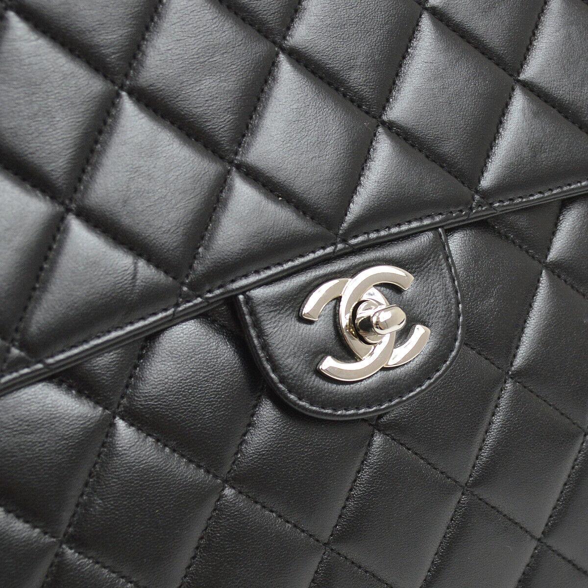 Chanel Black Lambskin Leather Silver Jumbo Evening Shoulder Flap Bag

Lambskin leather
Silver tone hardware
Turnlock closure
Leather lining
Date code present 
Shoulder strap drop 24.5