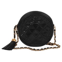 Chanel Piel de cordero negra Vintage Mini Bolso redondo con flecos Timeless