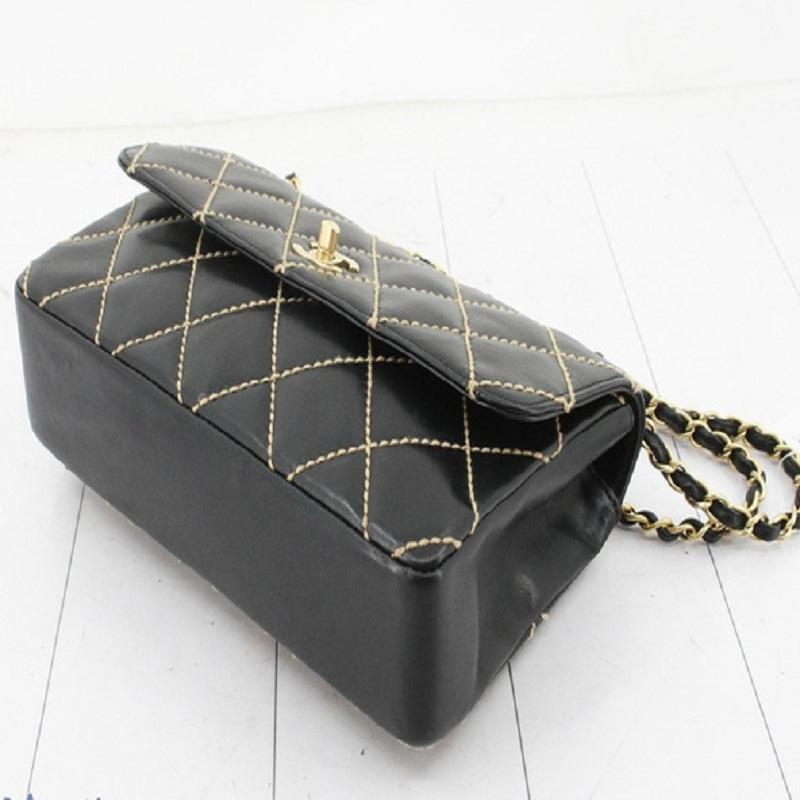 Black Lambskin leather and signature diamond-quilted with contrast stitching Chanel CC Single Flap bag with gold-tone hardware, woven leather and chain-link shoulder strap, front flap closure with interlocking CC turn-lock closure, main compartment