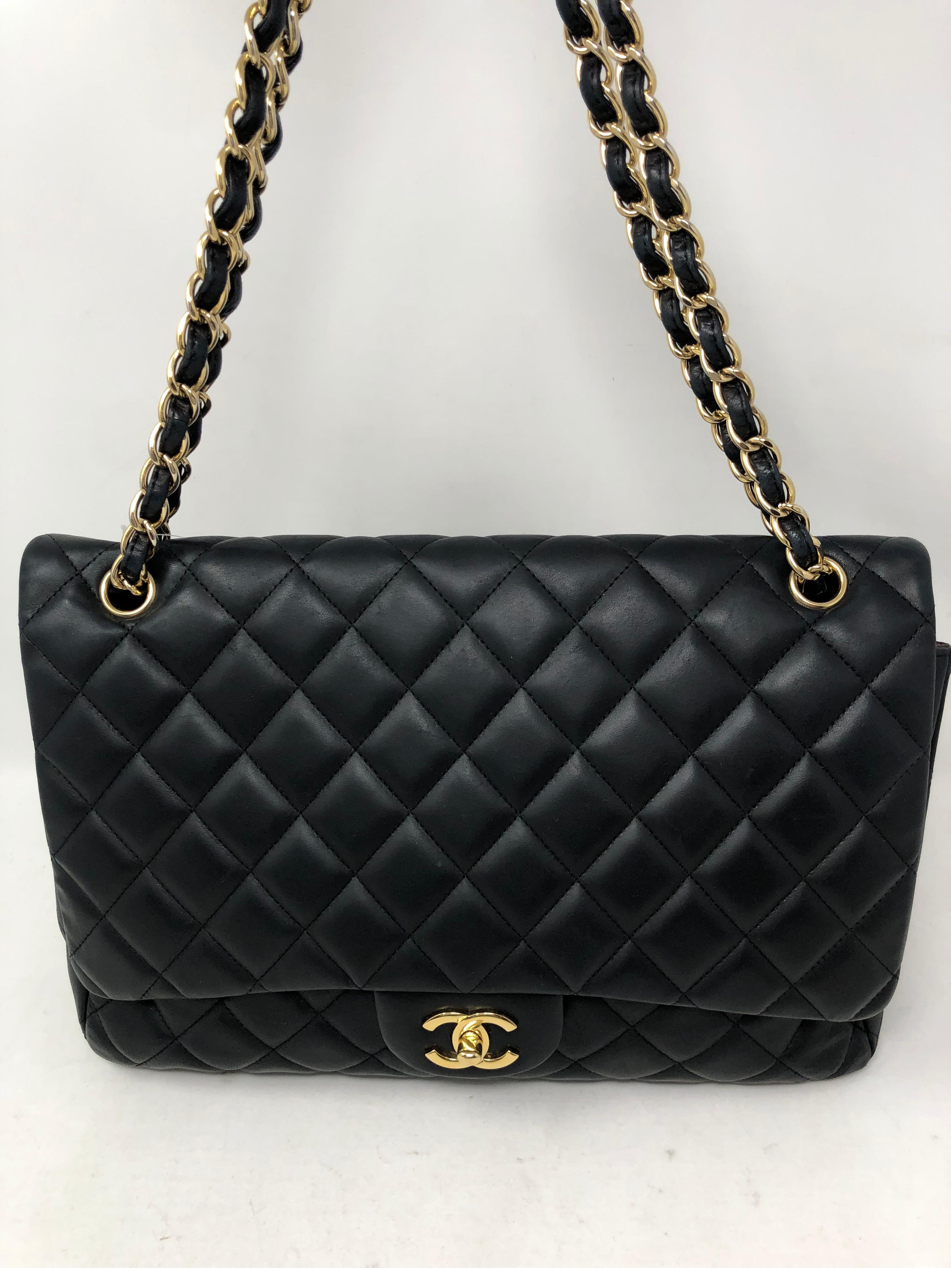 Chanel Black Lambskin Maxi Single Flap Bag. Excellent condition. Gold hardware. Maxi 13
