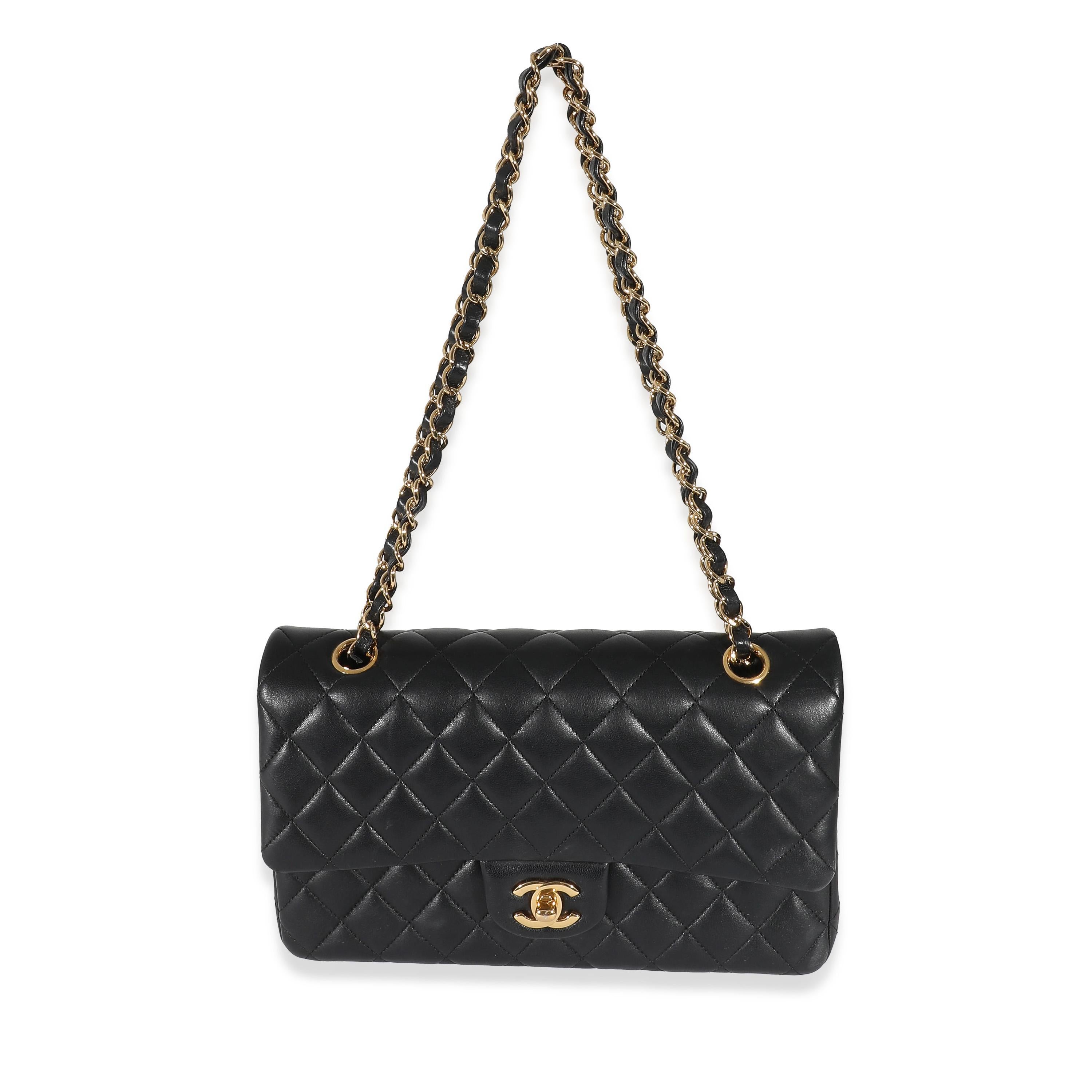 Listing Title: Chanel Black Lambskin Medium Classic Double Flap Bag
SKU: 132539
Condition: Pre-owned 
Handbag Condition: Very Good
Condition Comments: Item is in very good condition with minor signs of wear.  Exterior corner scuffing and throughout.