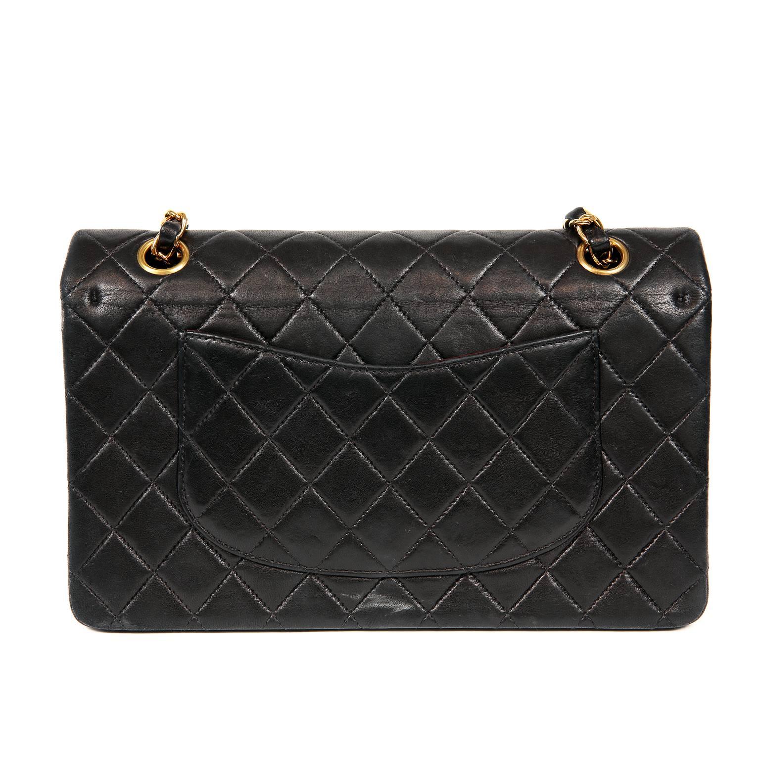 Chanel Black Lambskin Medium Classic Flap Bag- Mint Condition
Perfectly scaled in the medium silhouette, the Black Lambskin Classic with Gold Hardware is one of the most sought-after classics from Chanel.  Easily transitions from day to evening and 