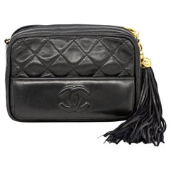 Vintage Chanel Black Lambskin Mini Tassel Camera Bag with 24KT Hardware, 1989 - 1991.