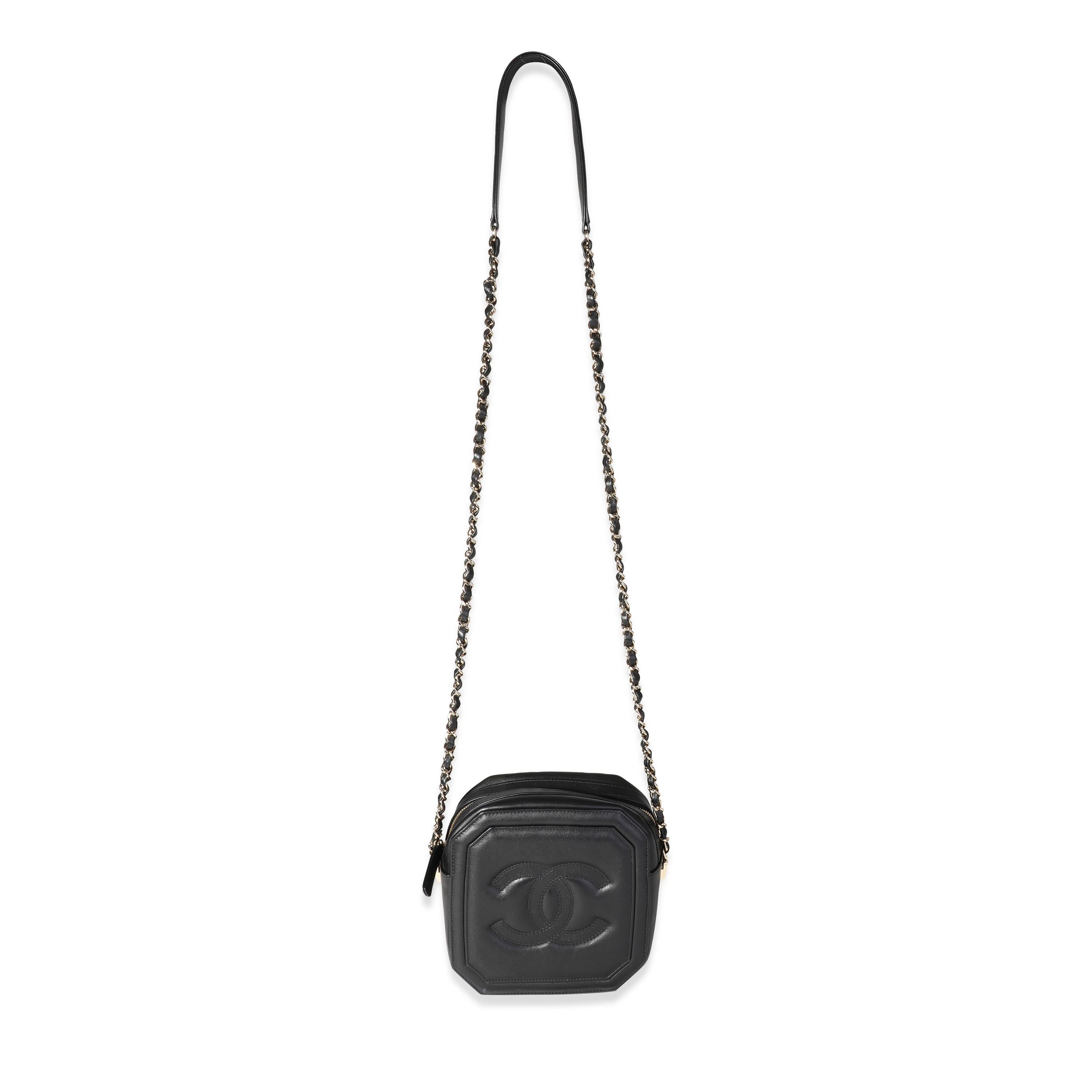 Listing Title: Chanel Black Lambskin Octagon Camera Bag
SKU: 117440
Condition: Pre-owned (3000)
Handbag Condition: Excellent
Condition Comments: Interior shows signs of use.
Brand: Chanel
Origin Country: France
Handbag Silhouette: Crossbody