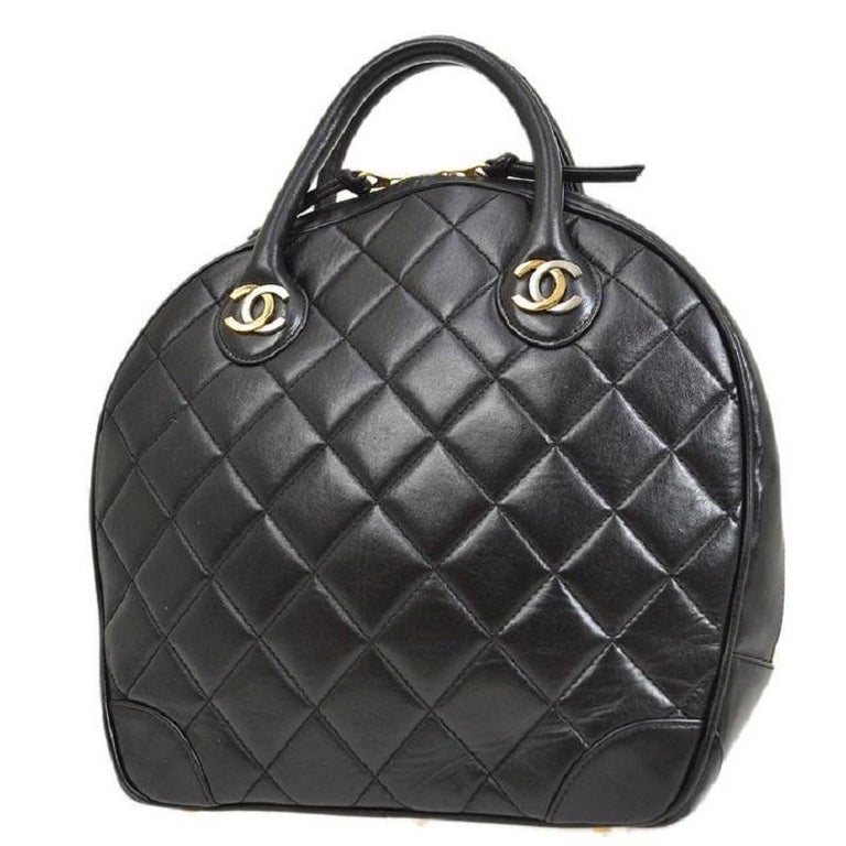 CHANEL Black Lambskin Quilted Leather Gold Silver Top Handle