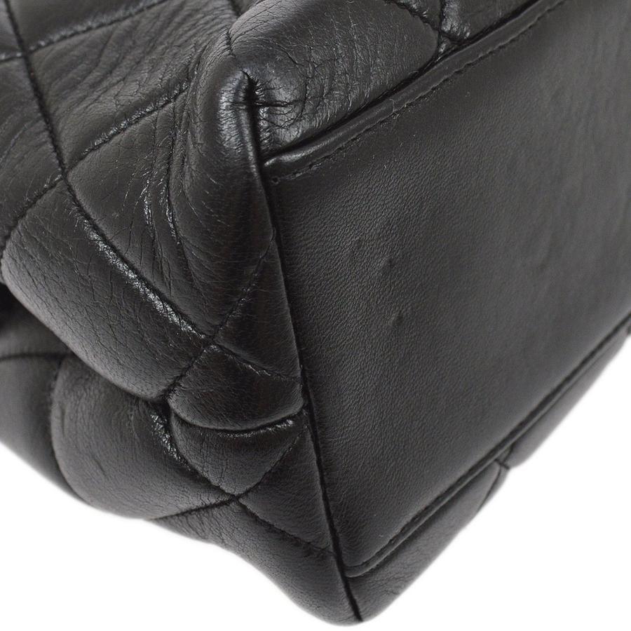 Women's CHANEL Black Lambskin Quilted Leather Kisslock Closure Evening Shoulder Bag