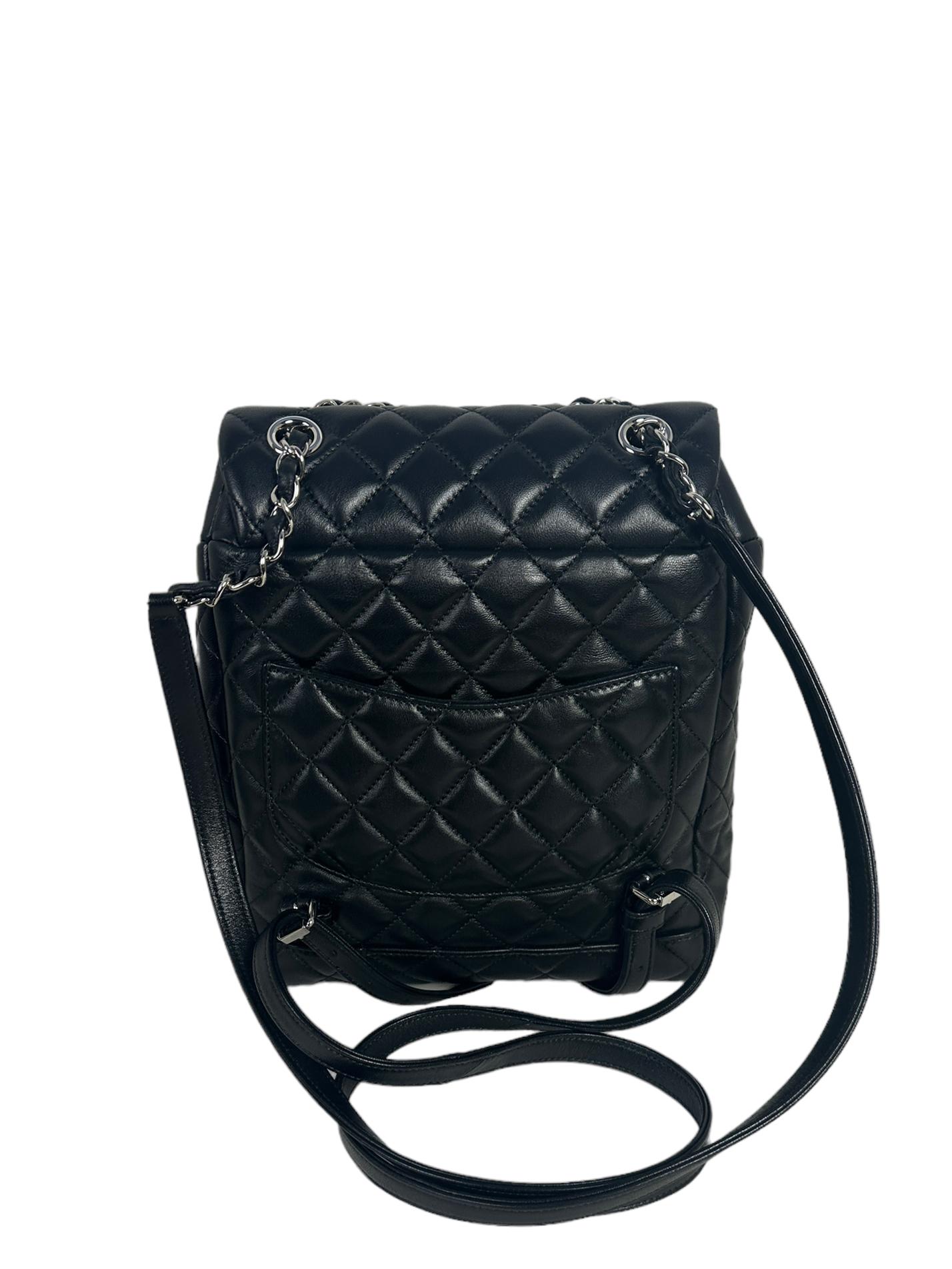 Chanel Black Lambskin Quilted Urban Spirit Backpack Bag

Made In: Italy
Year of Production: 2016
Color: Black
Hardware: Silvertone
Materials: Lambskin leather, metal
Lining: Black grosgrain
Closure/Opening: Flap top with CC twist-lock
Exterior