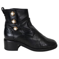 CHANEL black leather 17A COSMOPOLITE PEARL BUTTON Ankle Boots Shoes 38