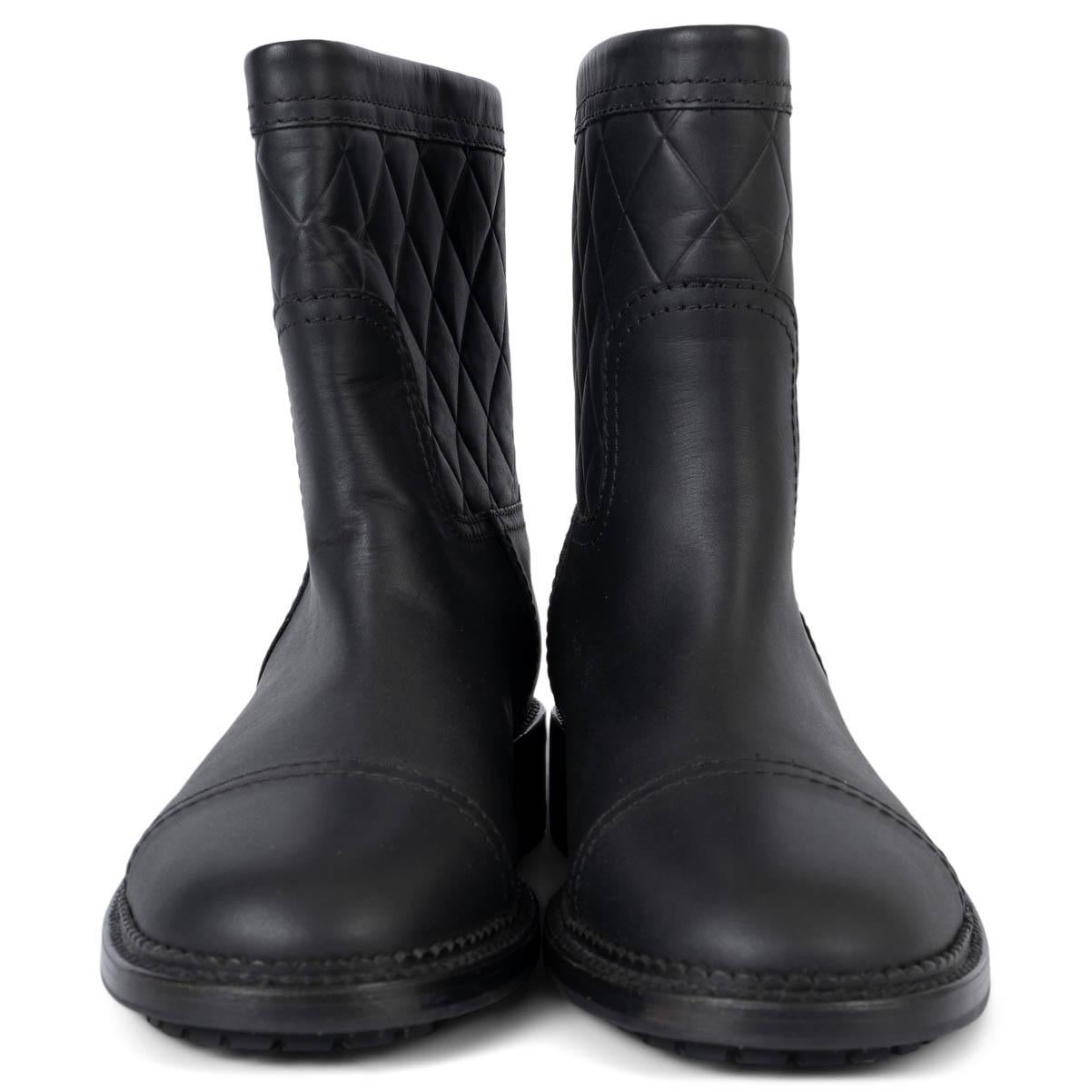 100% authentic Chanel biker boots in black mat calfskin featuring quilted shaft with CC logo embossing. Open with a zipper on the heel and come with a black rubber sole. Brand new. 

2014 Fall/Winter

Measurements
Model	14K G29322
Imprinted