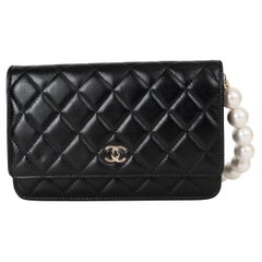 CHANEL black leather 20K MAXI PEARL Wallet On Chain WOC Bag