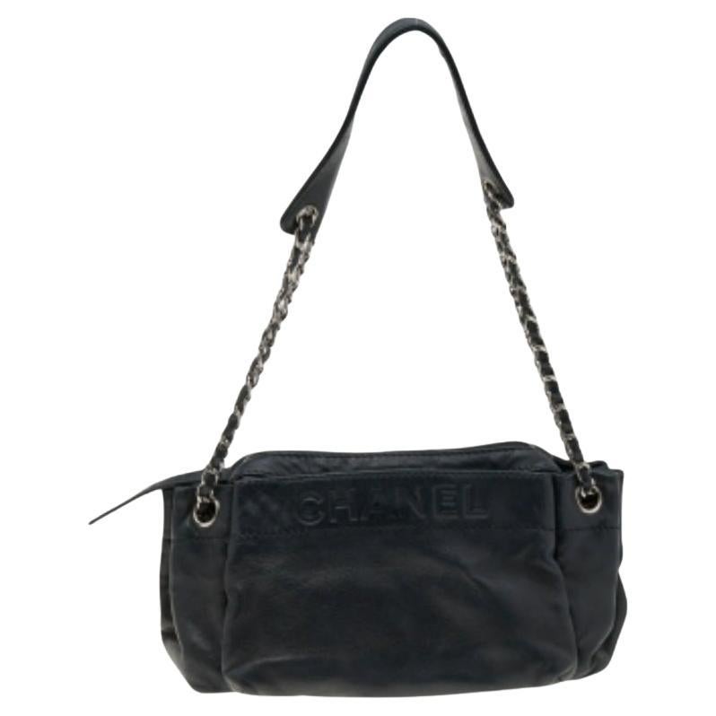 Borsa Chanel in pelle nera con chiusura a fisarmonica