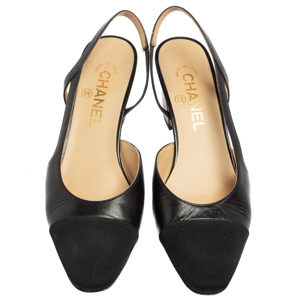 These pumps from Chanel will undoubtedly bring the label's graceful style and chic aesthetic to your feet. They are created using black leather as well as canvas. They display cap toes, slingbacks, and leather-lined insoles. Little gold-toned CC